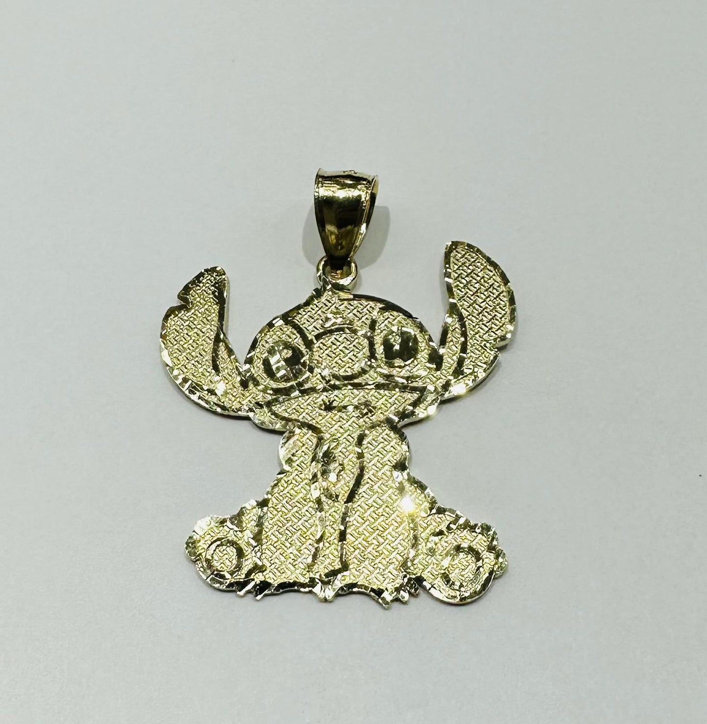 10K GOLD LARGE STICH PENDANT,  WEIGHT: 2.7gm