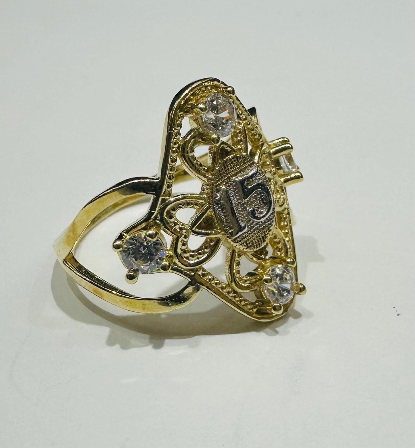 10K GOLD QUINCEANERA RING WITH CZ STONES -SIZE: 6.2  WEIGHT: 2.7gm
