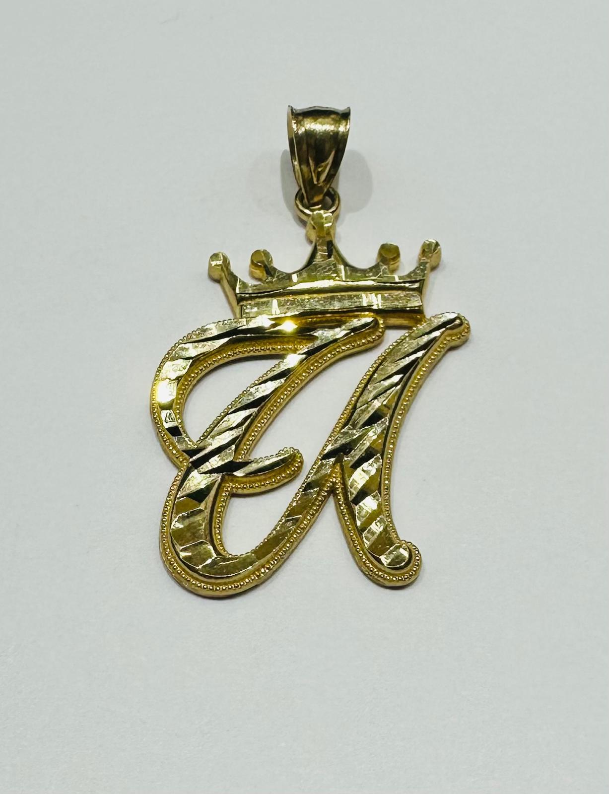 10K GOLD INITIAL LETTER "U" WITH A CROWN PENDANT- WEIGHT: 2.7gm