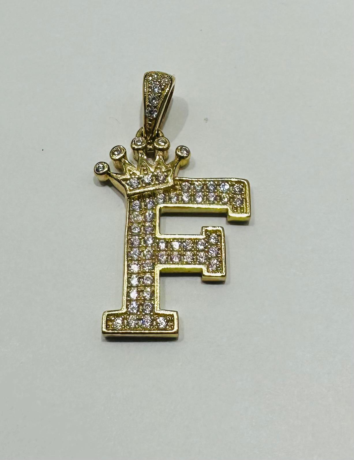 10K GOLD CZ STONE INITIAL LETTER "F" WITH A CROWN PENDANT- WEIGHT: 3.1gm