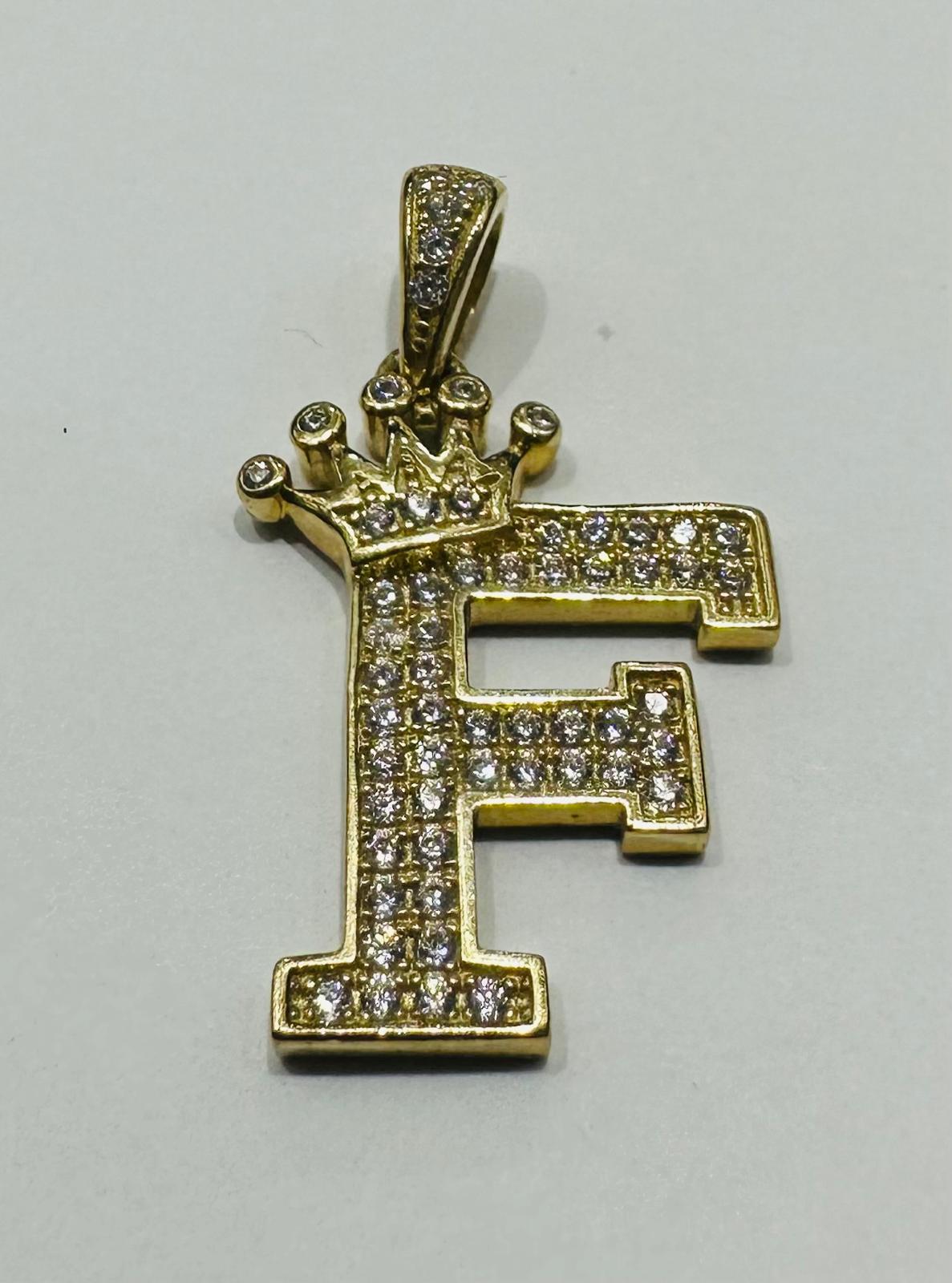10K GOLD CZ STONE INITIAL LETTER "F" WITH A CROWN PENDANT- WEIGHT: 3.1gm