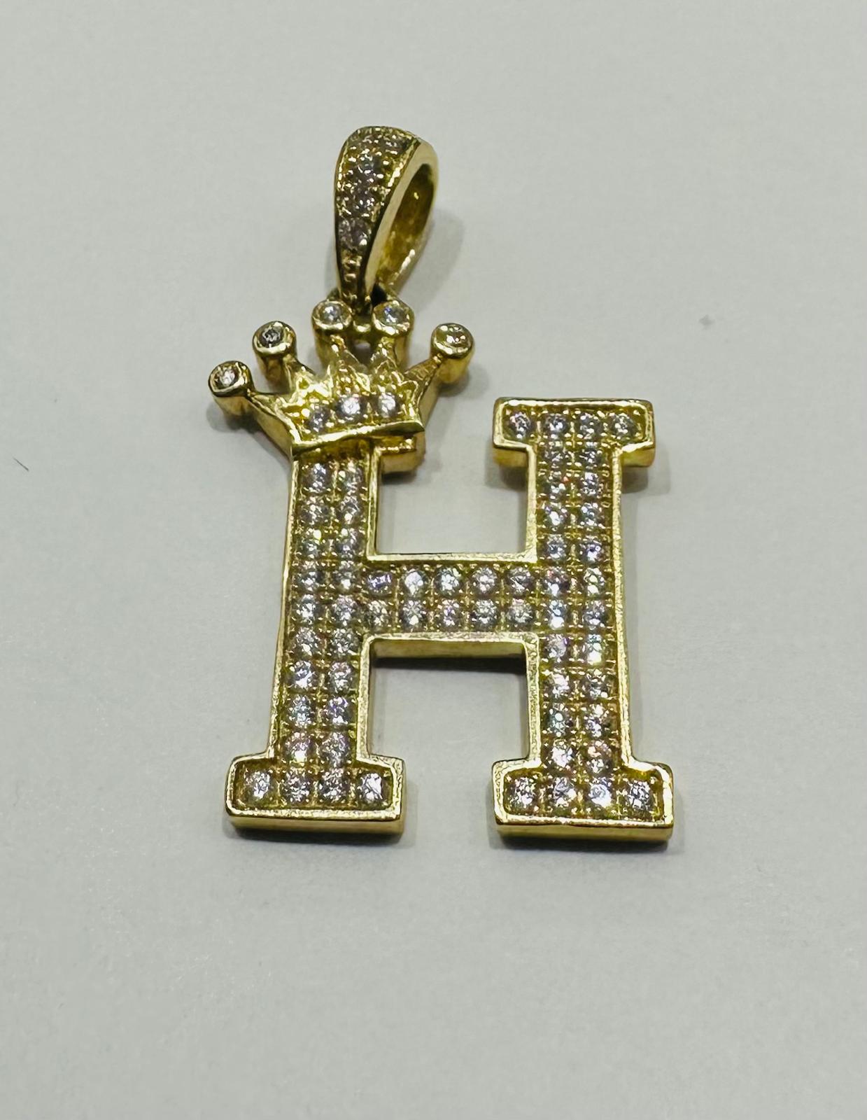10K GOLD CZ STONE INITIAL LETTER "H" WITH A CROWN PENDANT- WEIGHT: 2.5gm