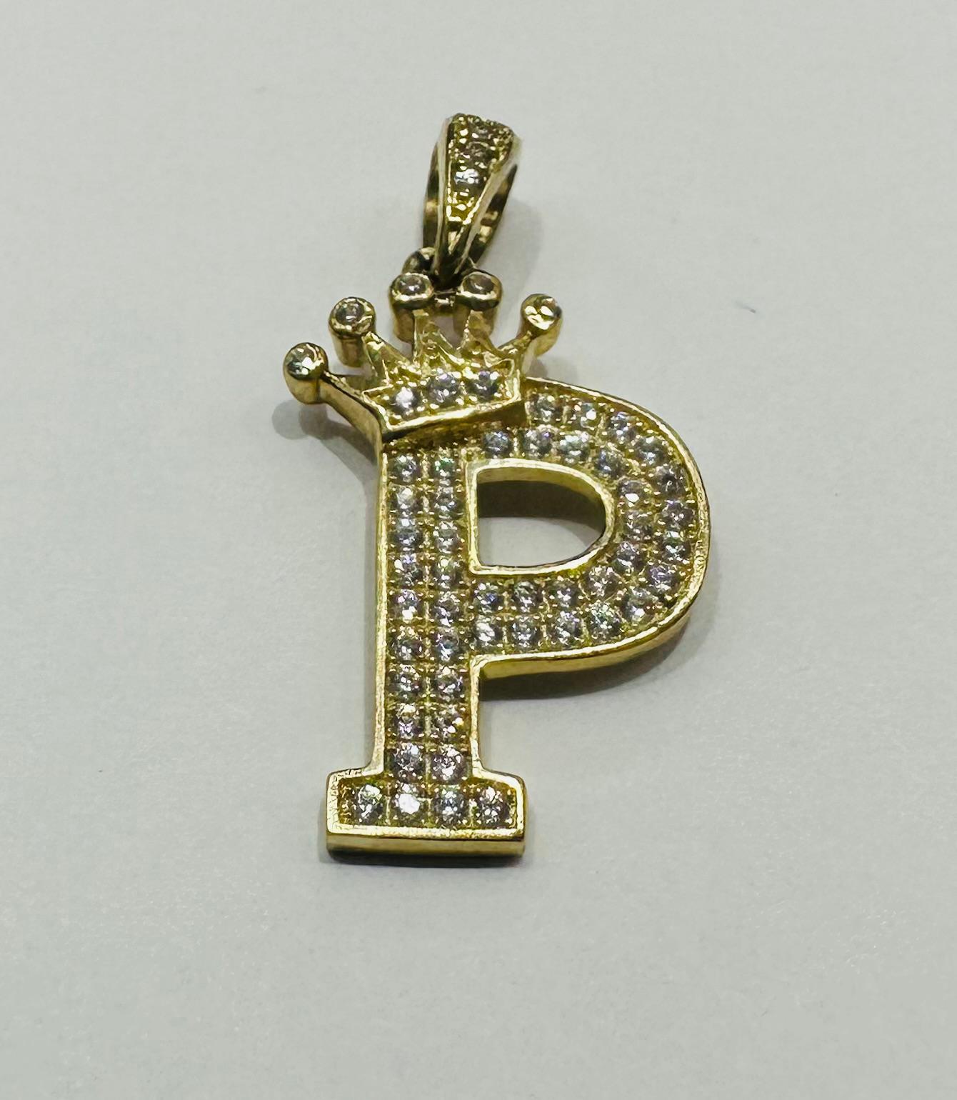 10K GOLD CZ STONE INITIAL LETTER "P" WITH A CROWN PENDANT- WEIGHT: 2.7gm