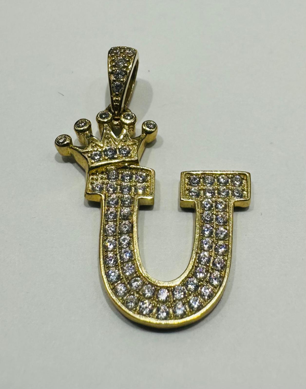 10K GOLD CZ STONE INITIAL LETTER "U" WITH A CROWN PENDANT- WEIGHT: 2.8gm