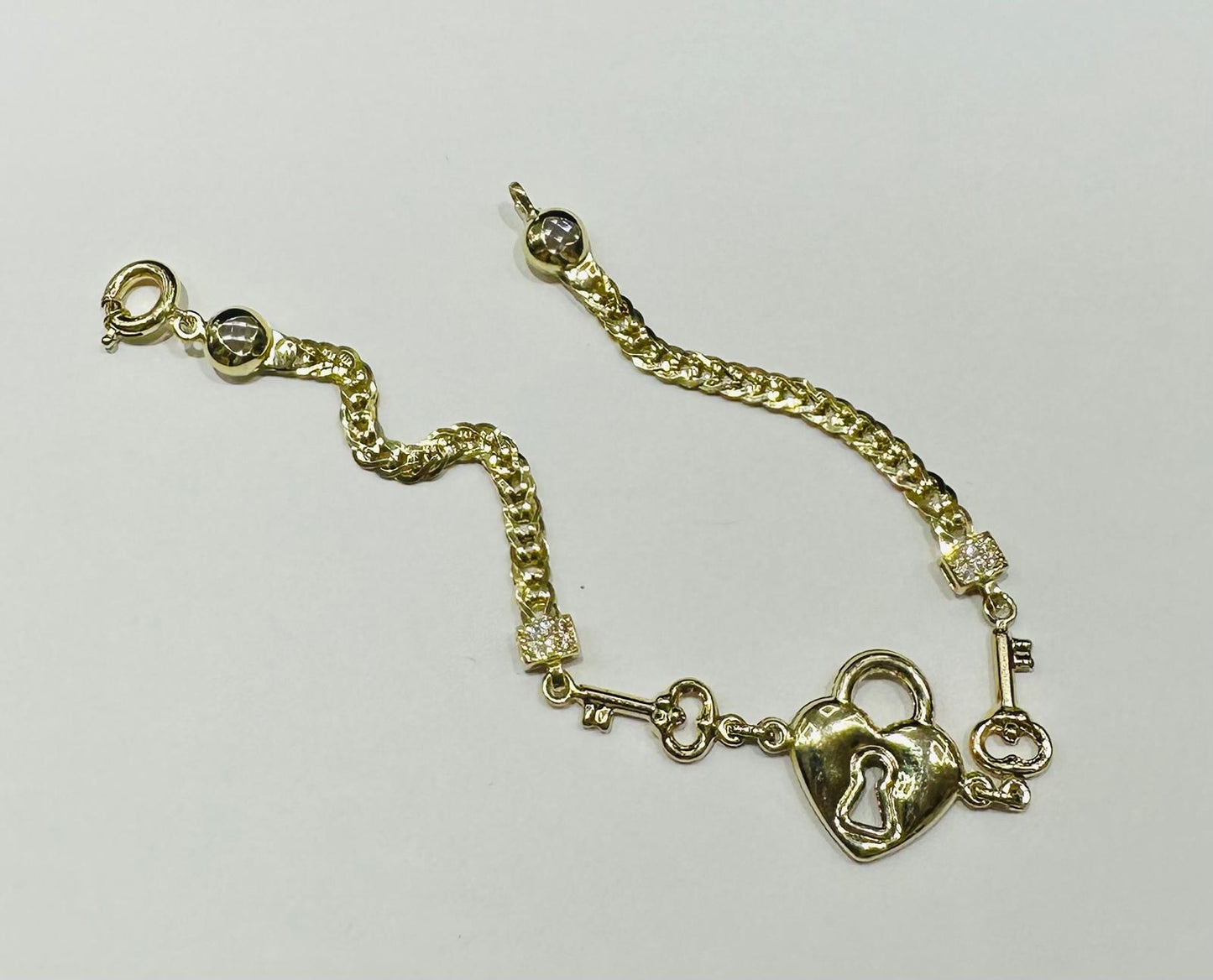 10K GOLD HEART LOCK AND KEY BRACELET 7.5" - 5.8gm