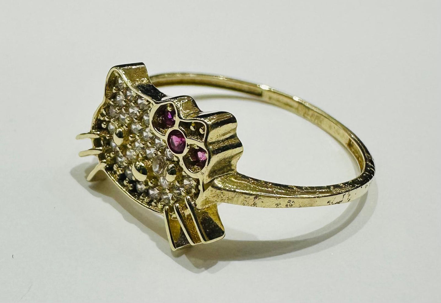 10K GOLD KITTY RING WITH  CZ STONES   WEIGHT:  1.5gm