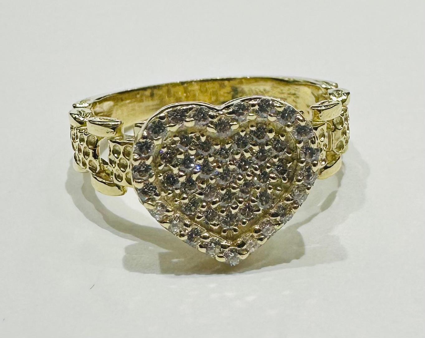 10K GOLD HEART RING WITH CZ STONES- WEIGHT: 3.1gm