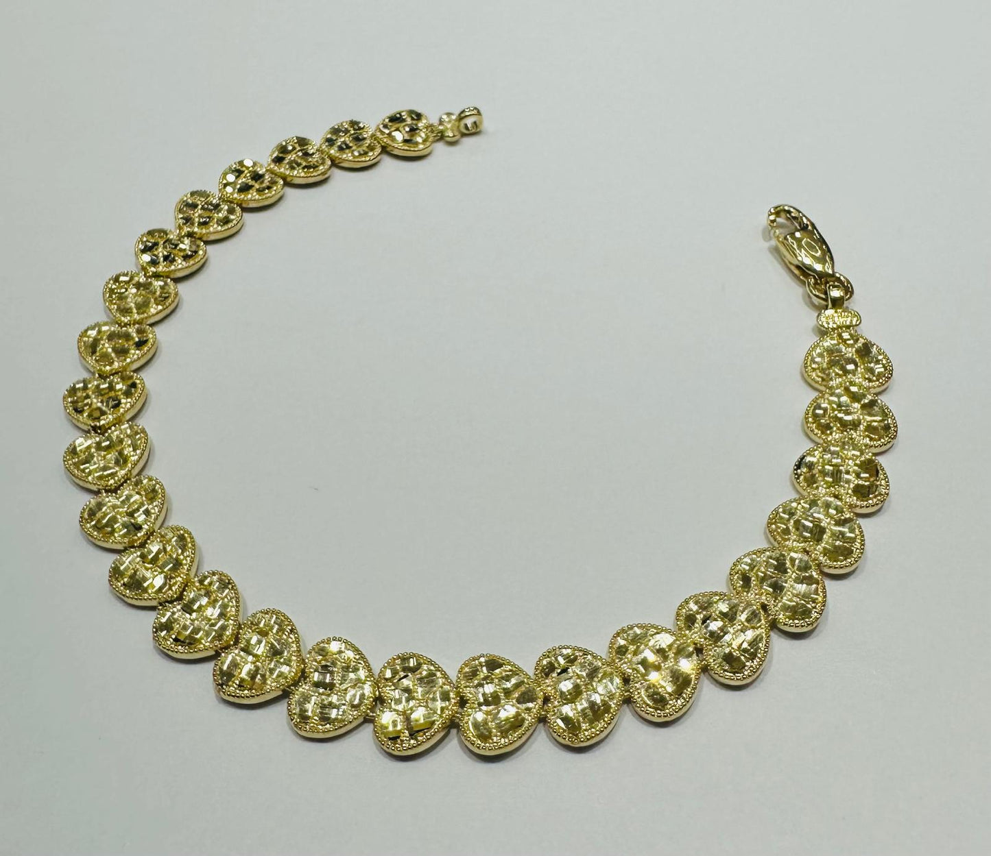 10K GOLD HEART NUGGET BRACELET- WEIGHT: 9.4gm