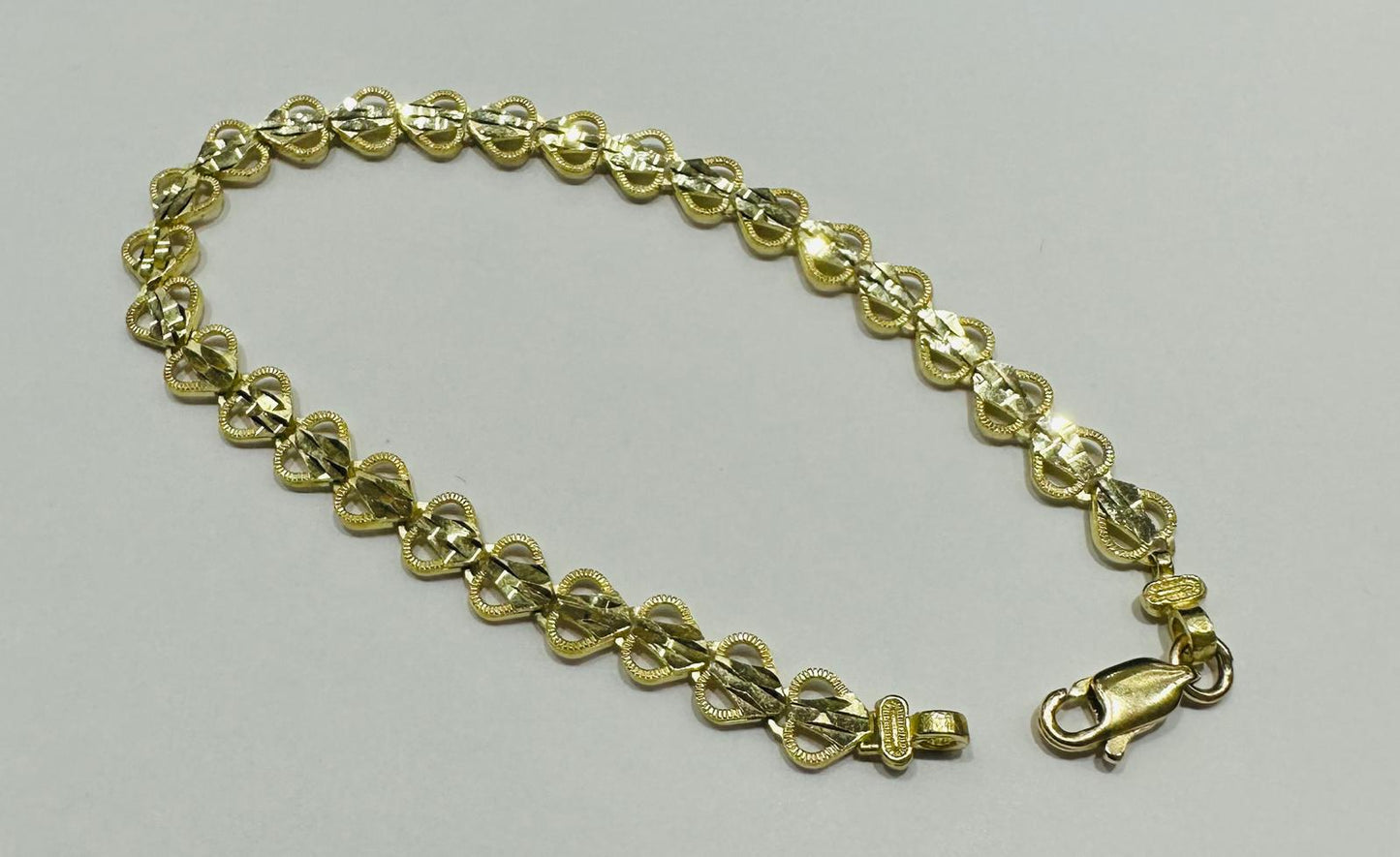 10K GOLD HEART BRACELET- WEIGHT: 5.4gm   7"