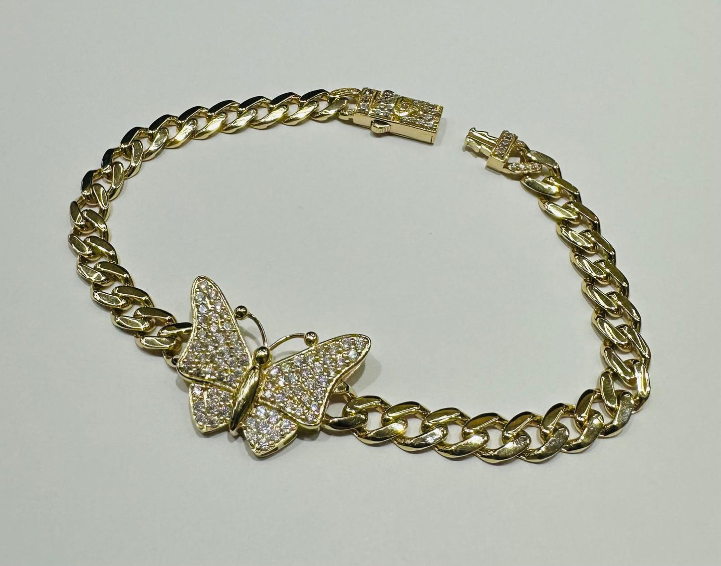 10K GOLD BUTTERFLY CUBAN LINK BRACELET- WEIGHT: 8.9gm   8"