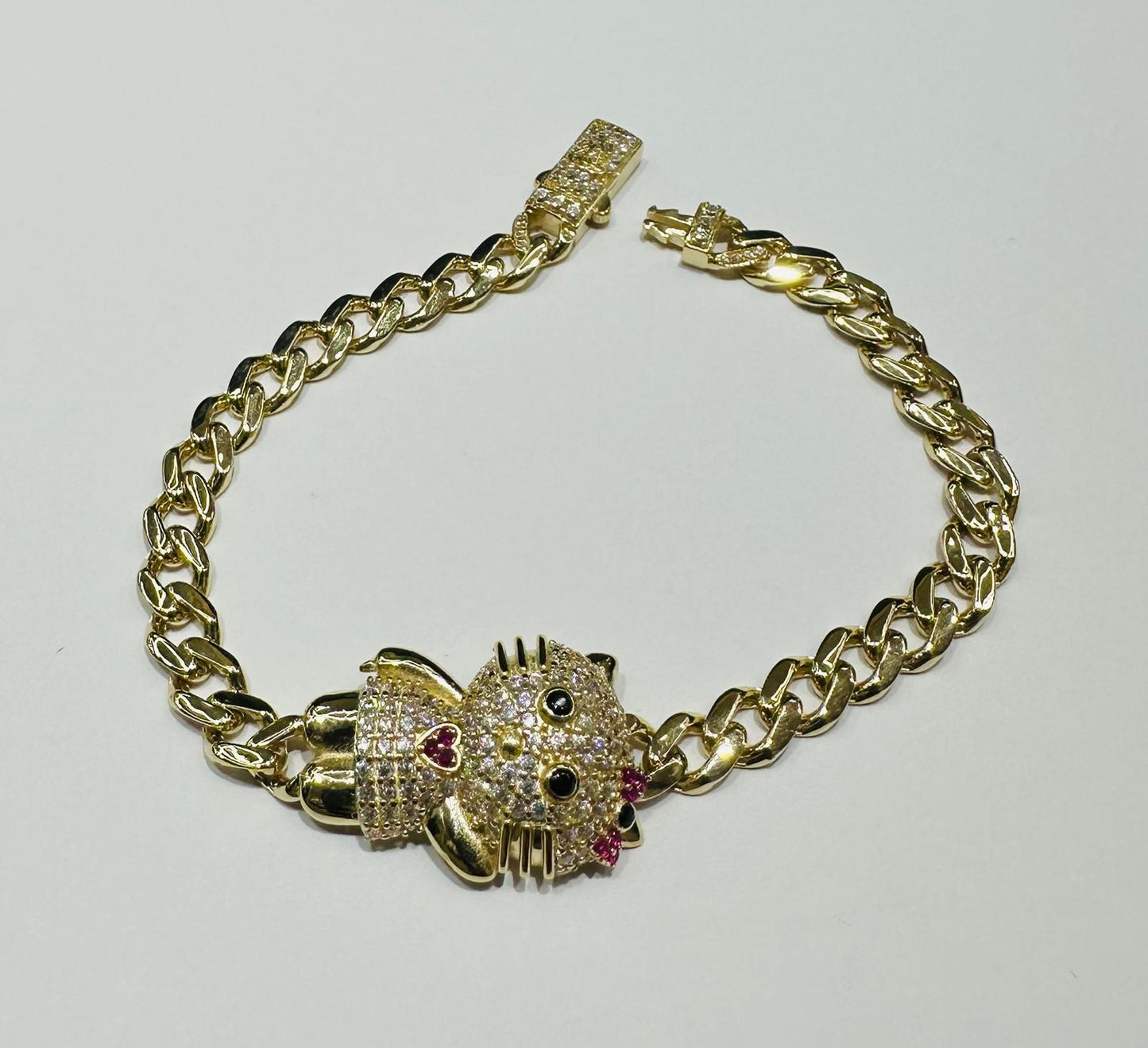 10K GOLD KITTY CUBAN LINK BRACELET- WEIGHT: 9.1gm   7.5"