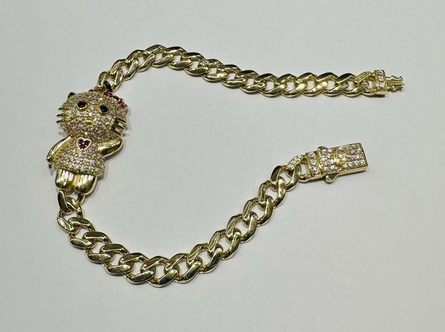 10K GOLD KITTY CUBAN LINK BRACELET- WEIGHT: 9.1gm   7.5"