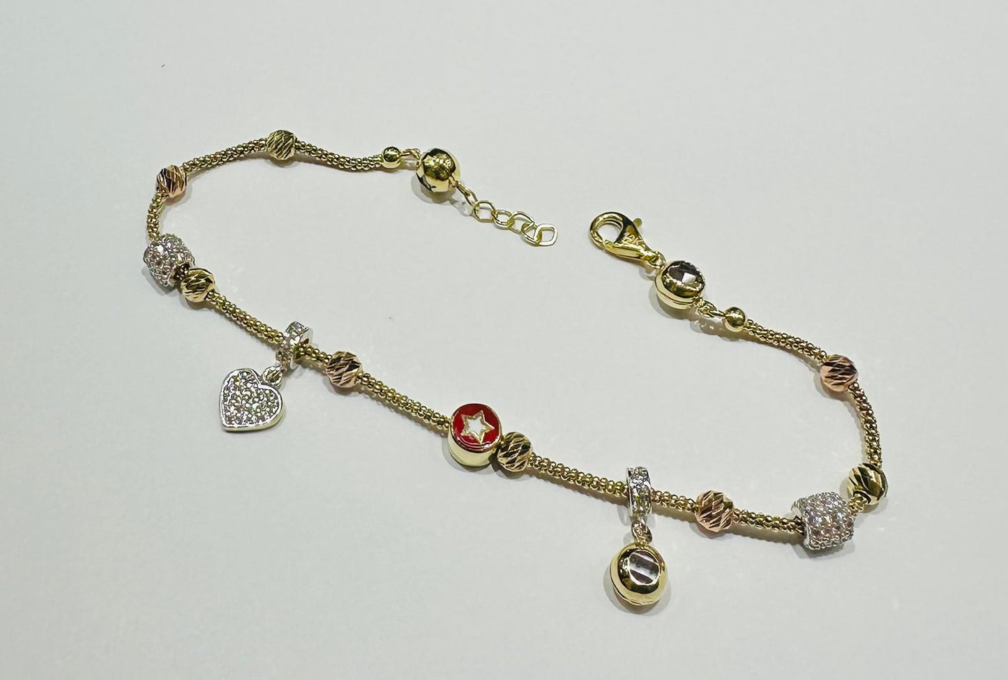 10K GOLD CHARM BRACELET- WEIGHT: 6.2gm