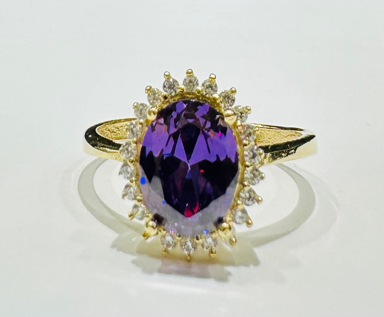 14K GOLD AMETHYST RING WITH CZ STONES- WEIGHT: 2.6gm
