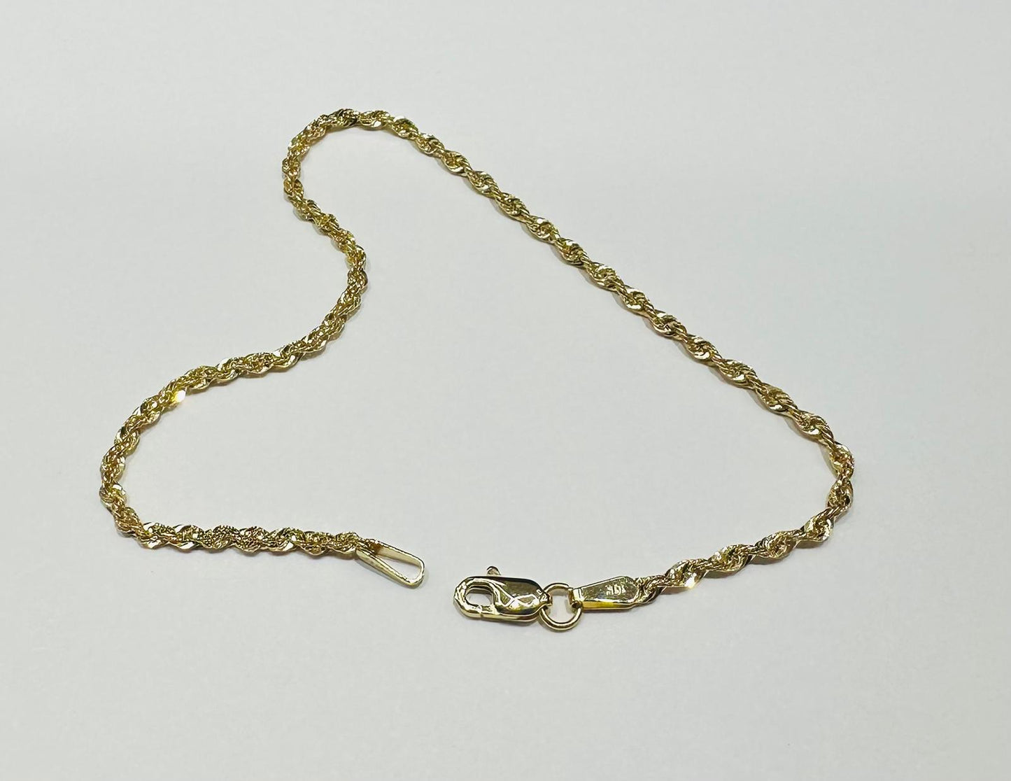 10K GOLD ROPE BRACELET- WEIGHT:  0.8gm   7"   1.55mm