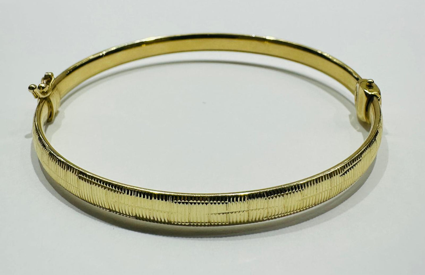 10K GOLD BANGLE BRACELET- WEIGHT:  6.6gm