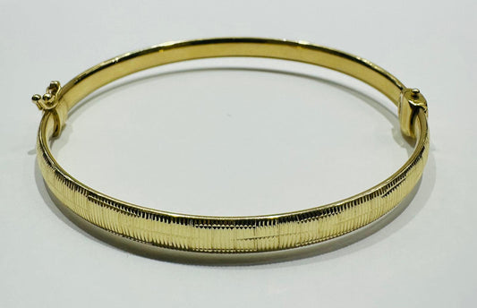 10K GOLD BANGLE BRACELET- WEIGHT:  6.6gm