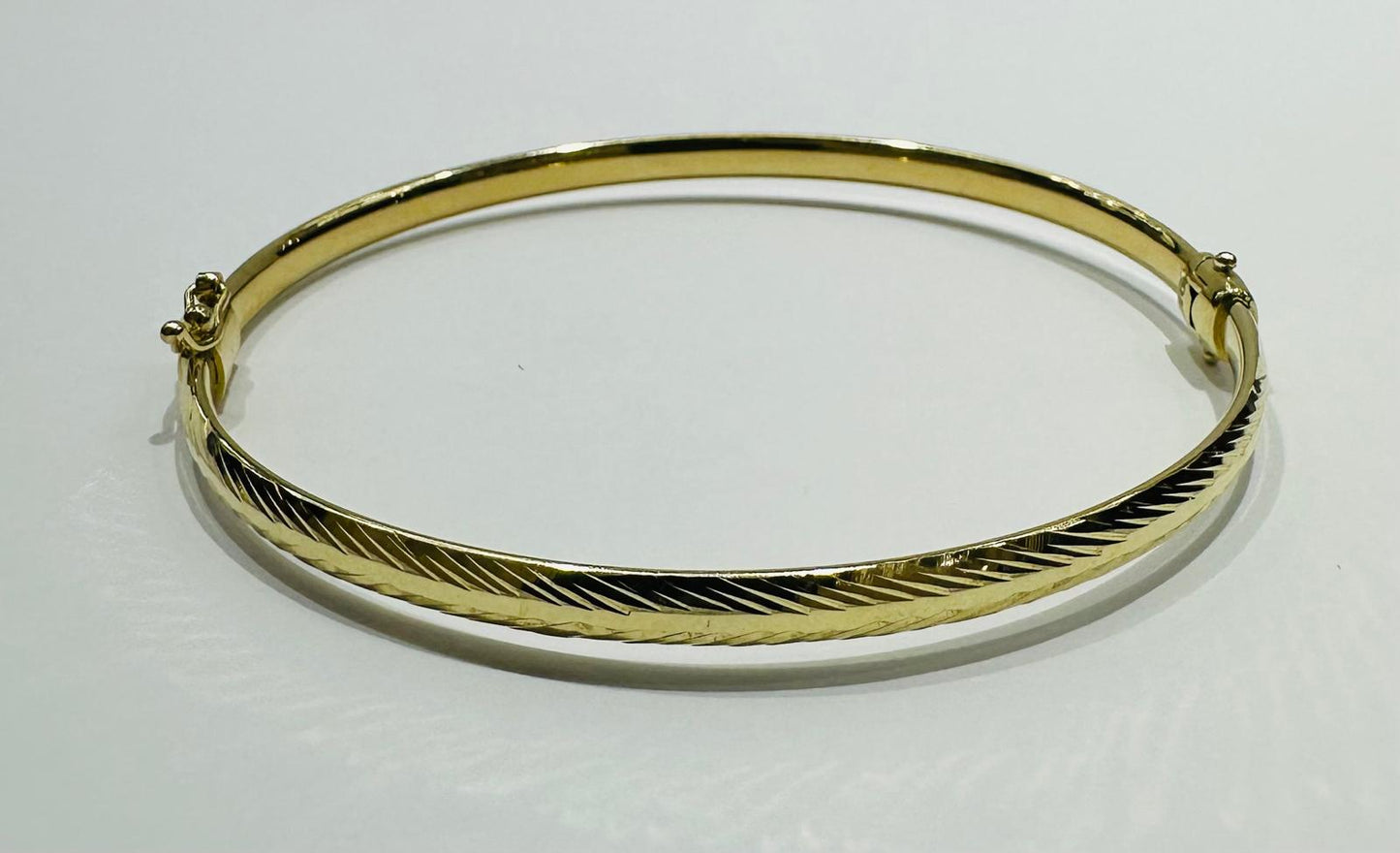10K GOLD BANGLE BRACELET- WEIGHT:  5.2gm