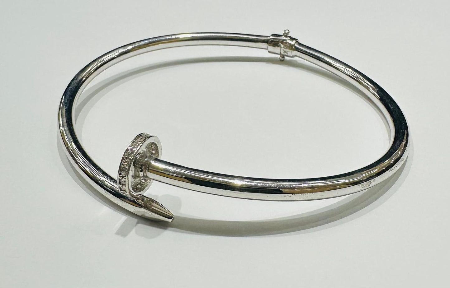 10K WHITE GOLD NAIL BRACELET- WEIGHT:  6.7gm