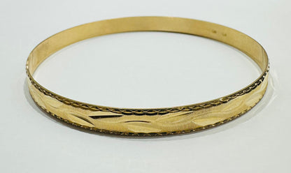 14K GOLD BANGLE BRACELET- WEIGHT:  9.1gm