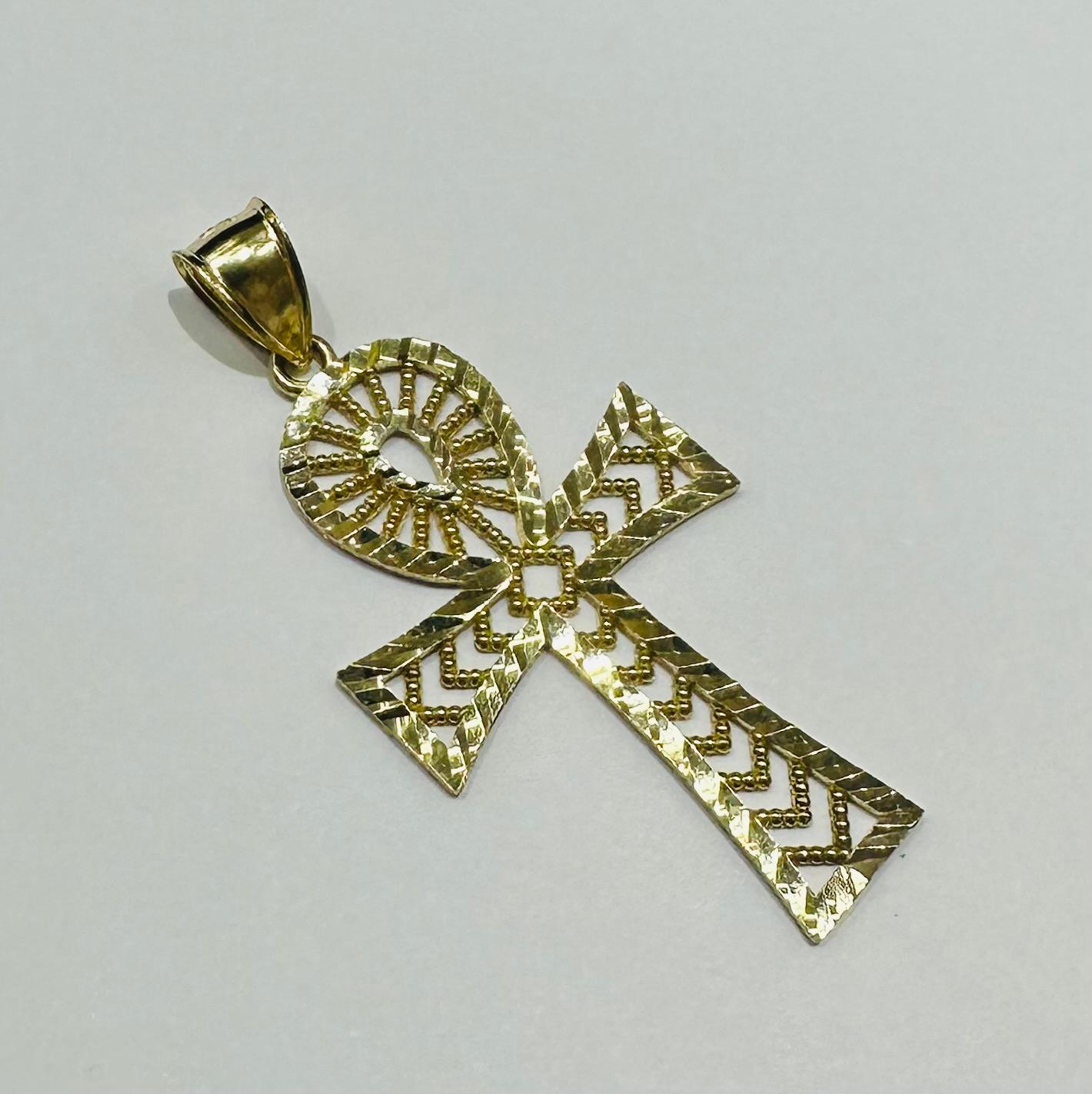 10K GOLD CROSS PENDANT- WEIGHT: 4.3gm