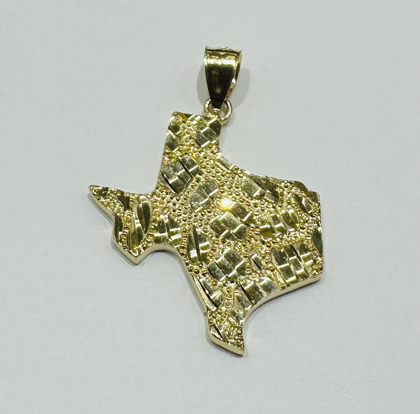 10K GOLD TEXAS NUGGET PENDANT-   WEIGHT: 5.9gm