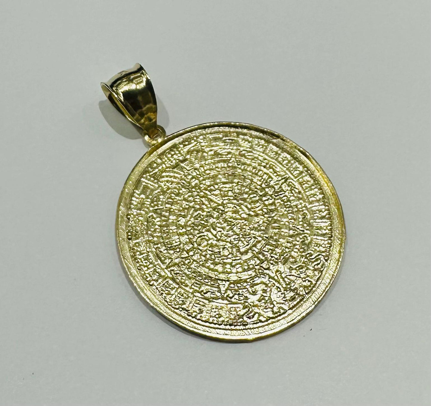 10K GOLD AZTEC CALENDER PENDANT-   WEIGHT: 4.8gm