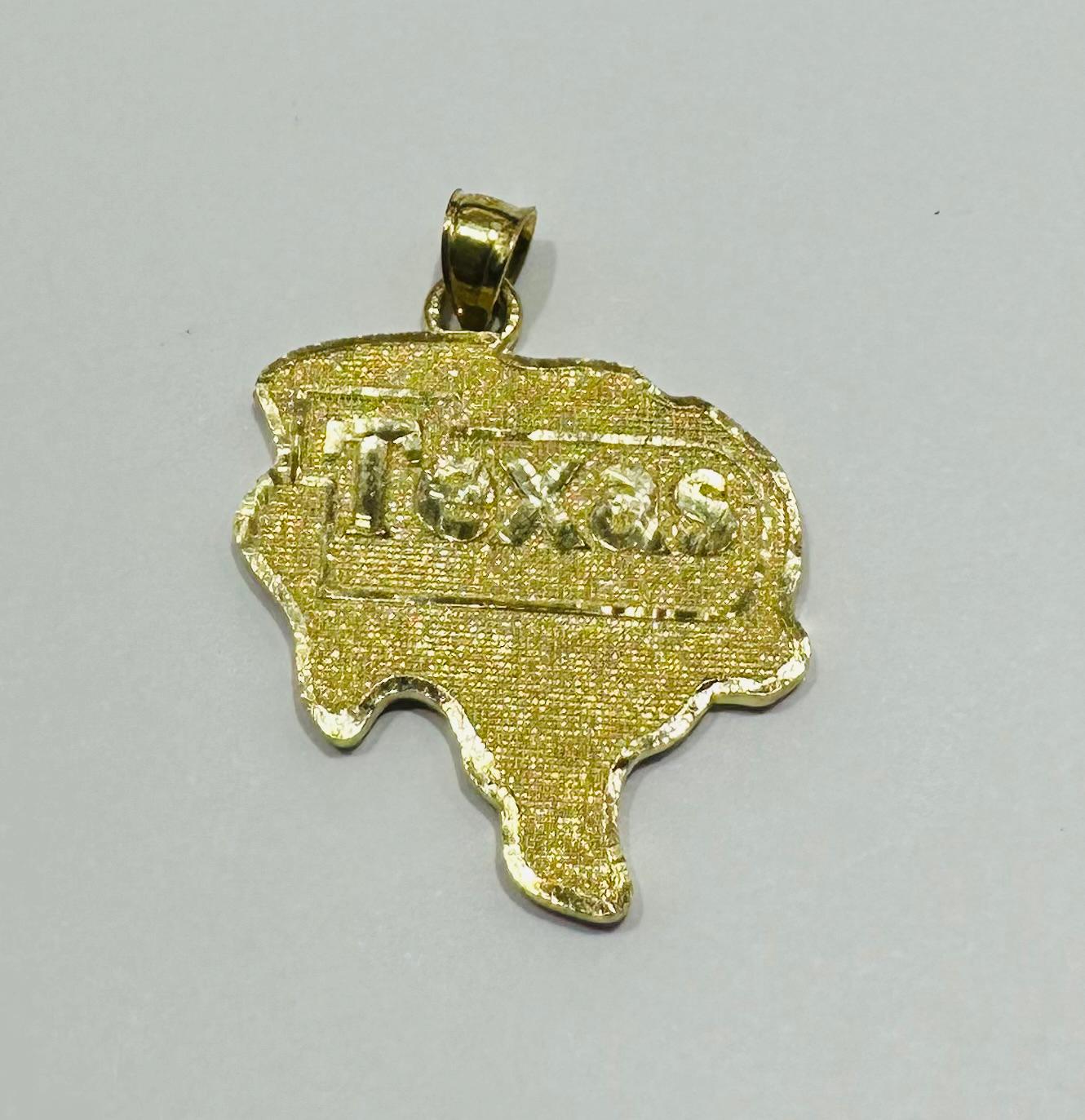 10K GOLD TEXAS PENDANT-   WEIGHT: 3.6gm