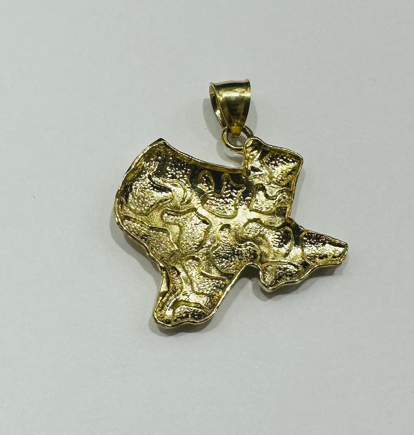 10K GOLD TEXAS NUGGET PENDANT-   WEIGHT: 3.5gm