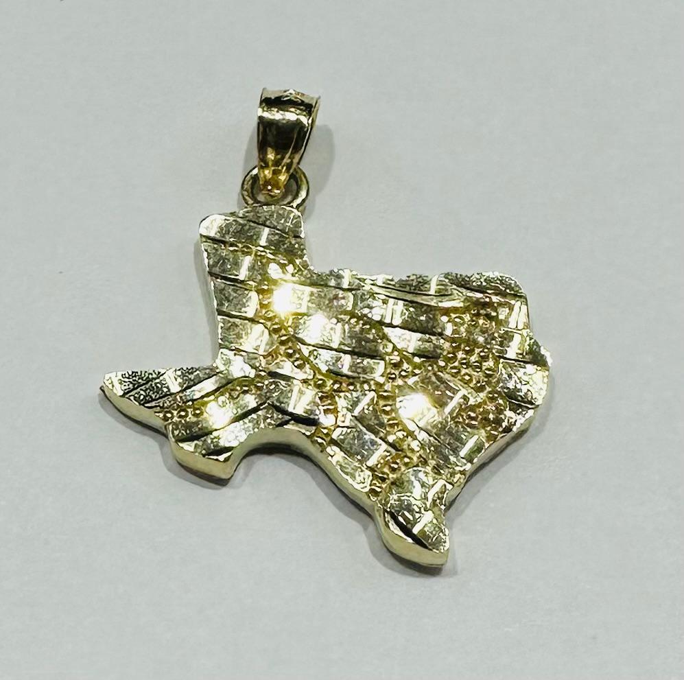 10K GOLD TEXAS NUGGET PENDANT-   WEIGHT: 2.3gm