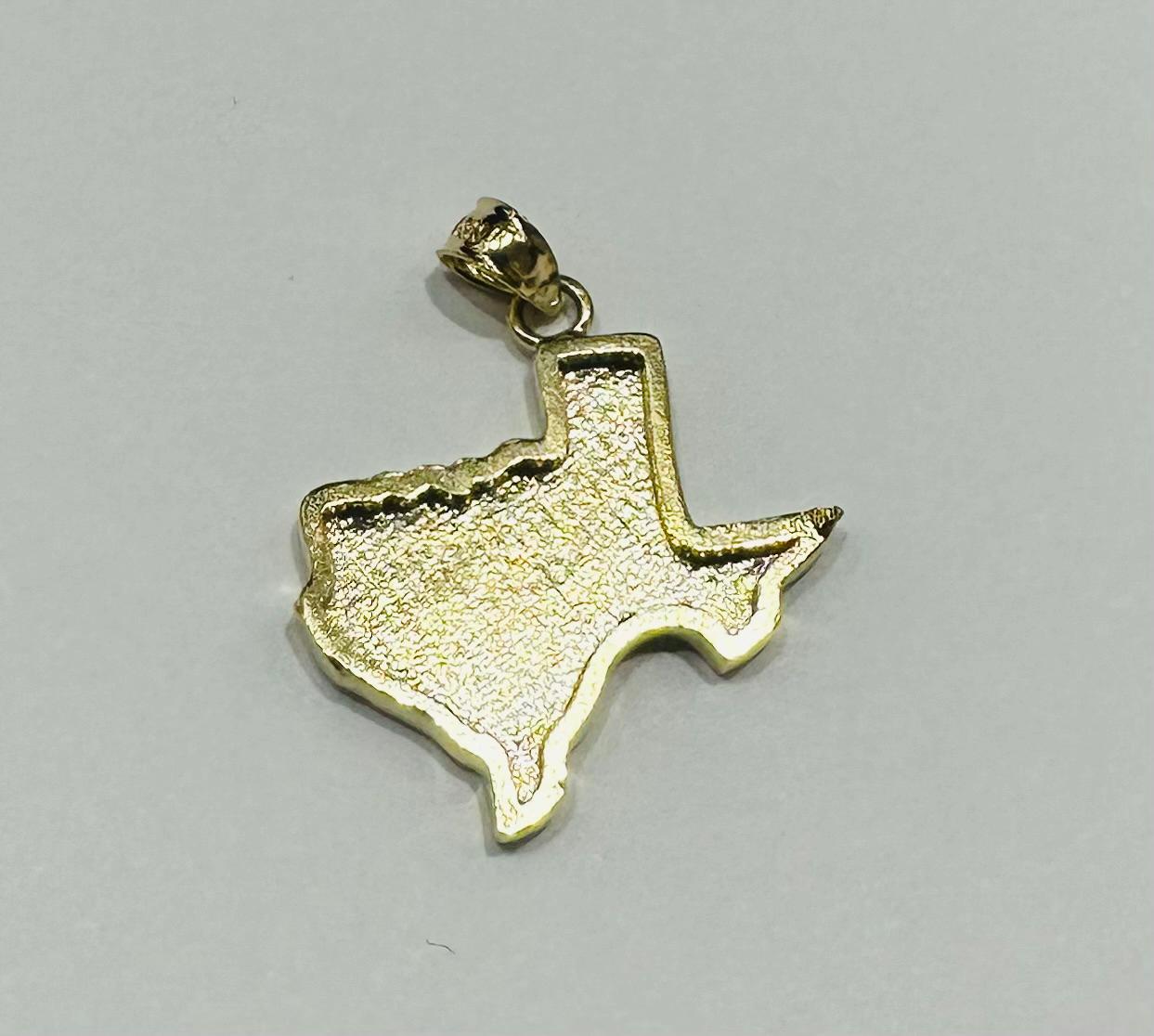 10K GOLD TEXAS NUGGET PENDANT-   WEIGHT: 2.3gm