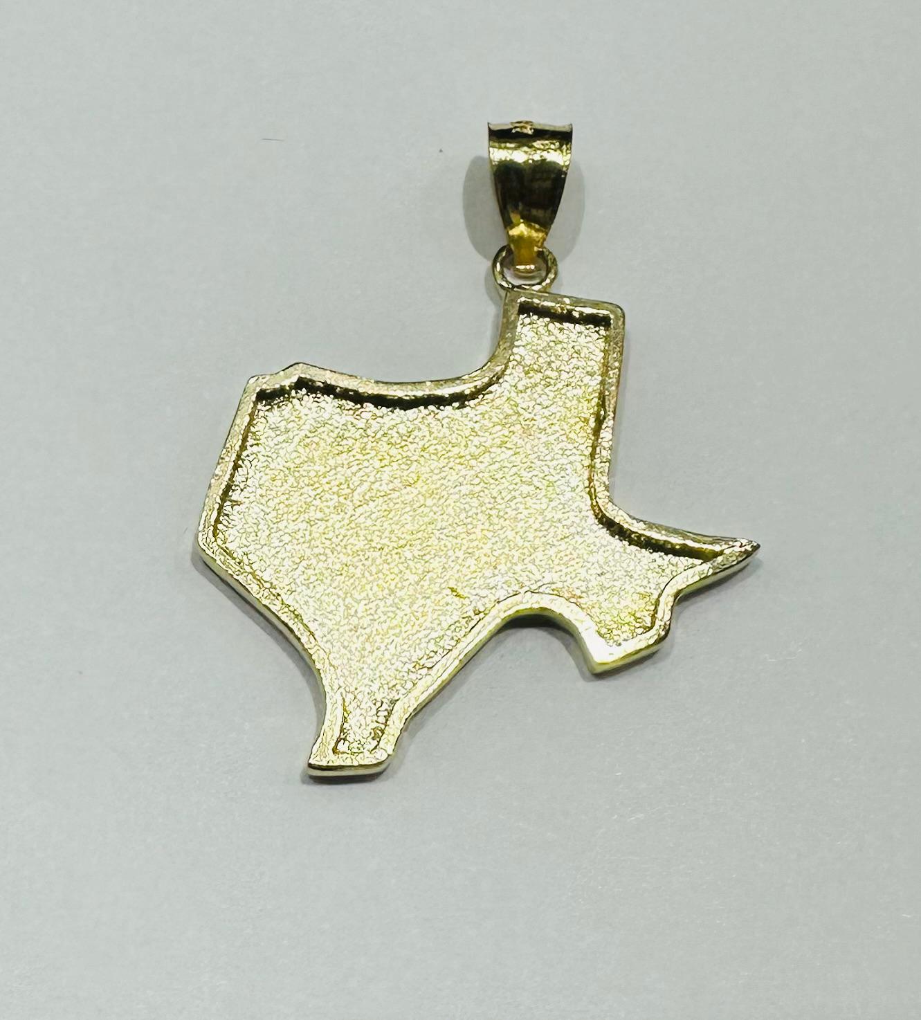 10K GOLD TEXAS NUGGET PENDANT-   WEIGHT: 3.5gm