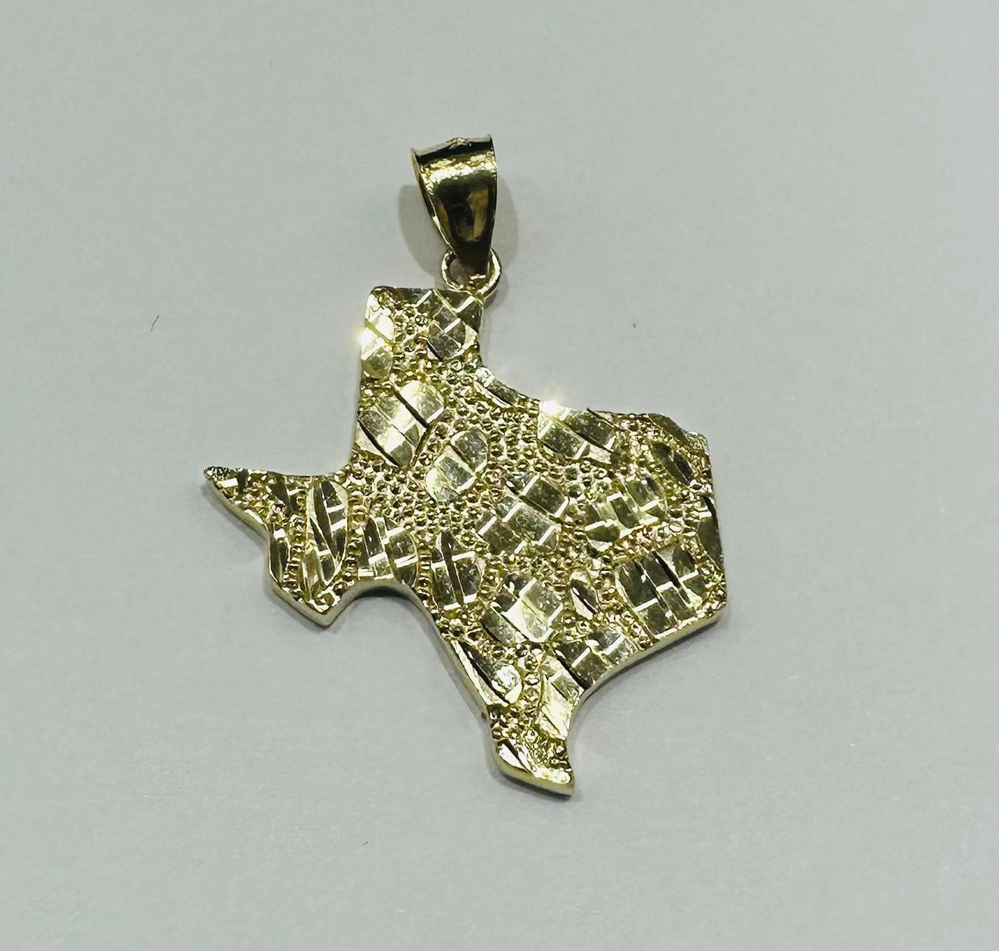 10K GOLD TEXAS NUGGET PENDANT-   WEIGHT: 3.5gm