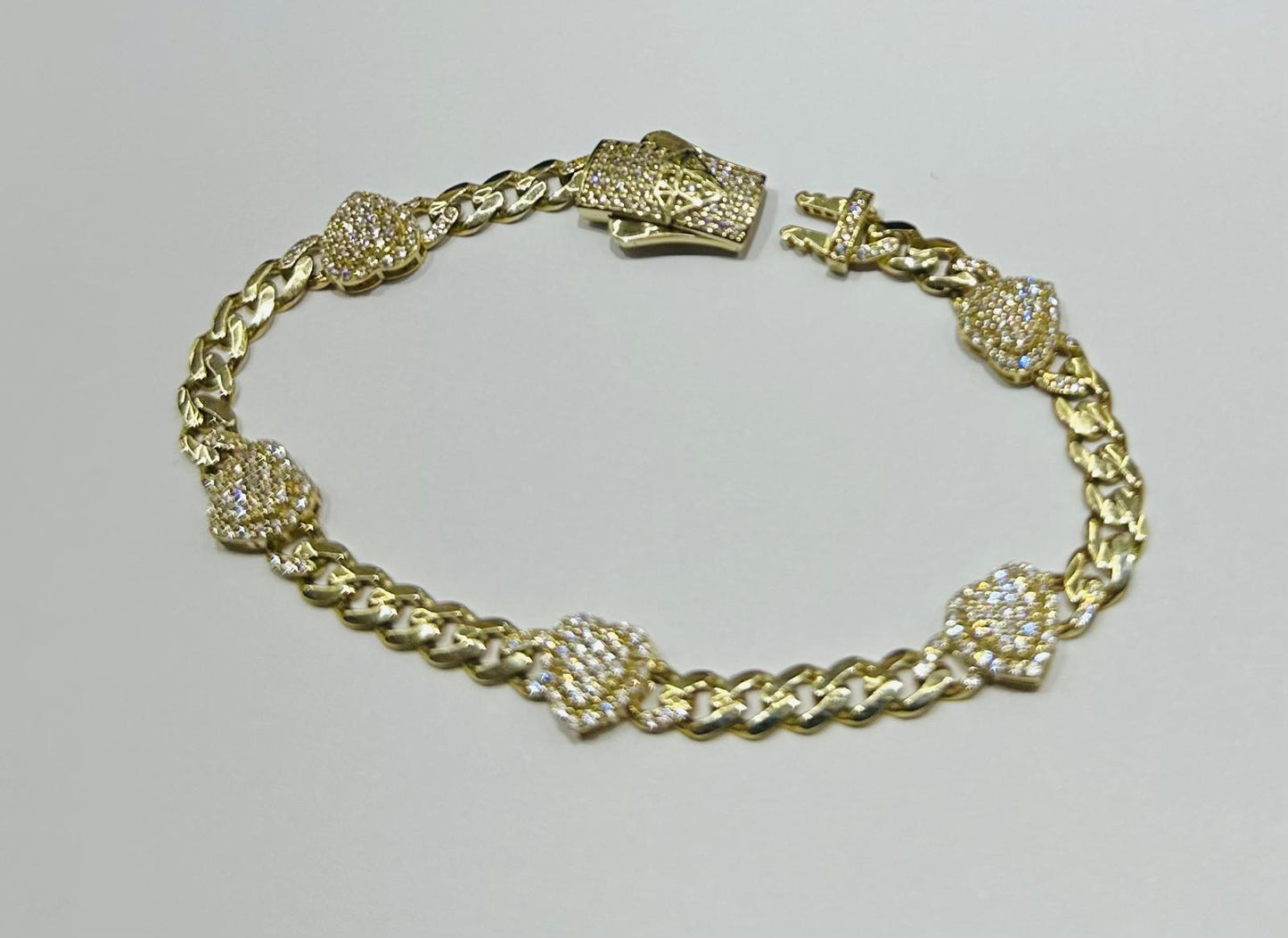 10K GOLD CUBAN LINK HEART CHAIN BRACELET- 7.5gm    7"