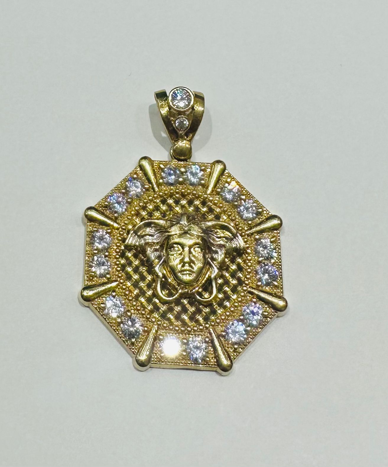 10K GOLD MEDUSA HEAD PENDANT WITH WHITE SAPPHIRE- WEIGHT: 9.7gm
