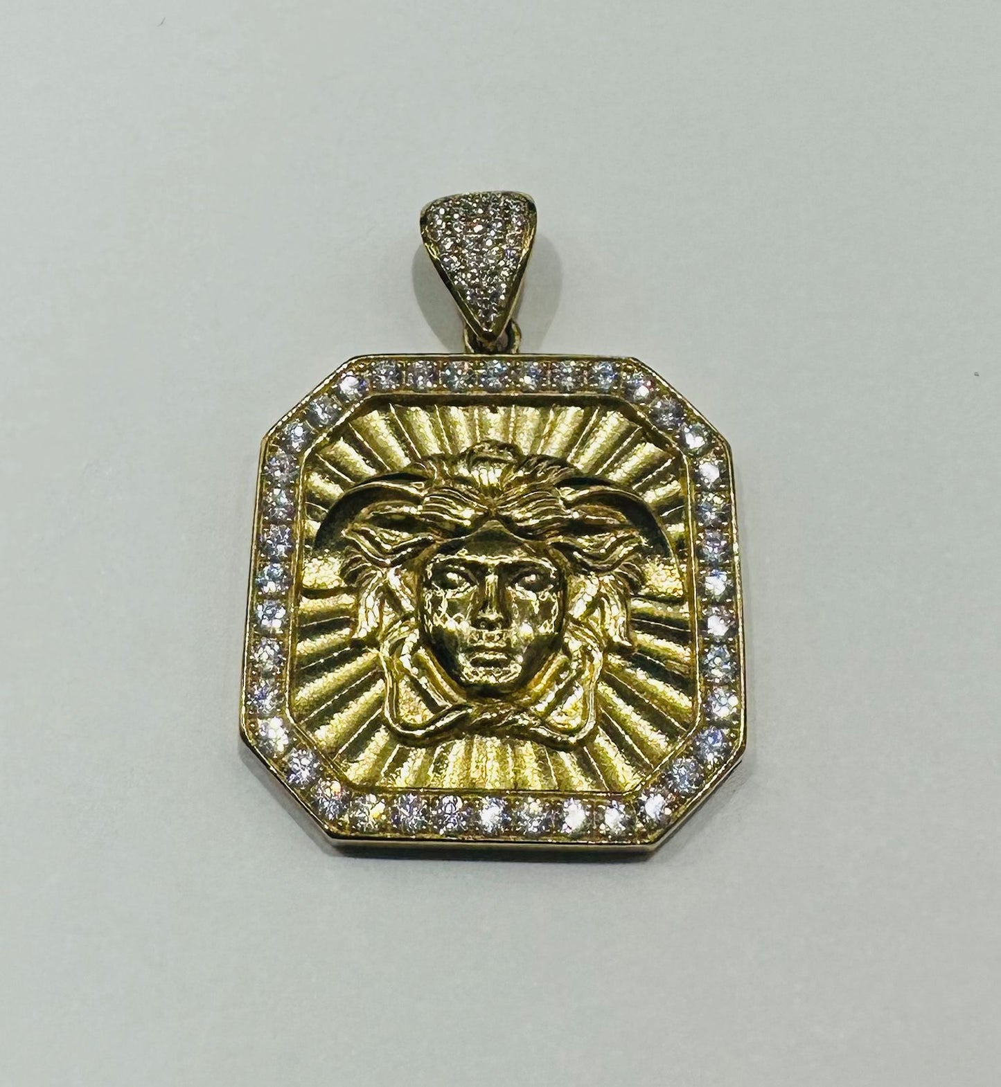 10K GOLD MEDUSA HEAD PENDANT WITH WHITE SAPPHIRE- WEIGHT: 8.8gm