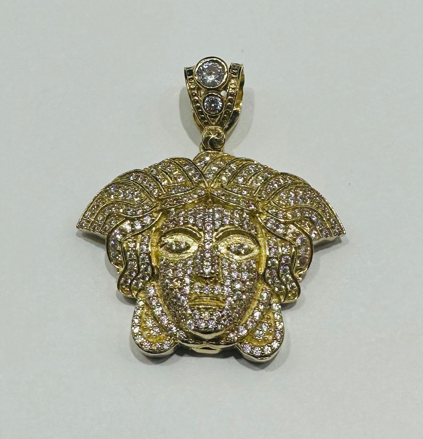 10K GOLD MEDUSA HEAD PENDANT WITH WHITE SAPPHIRE- WEIGHT: 10.6gm