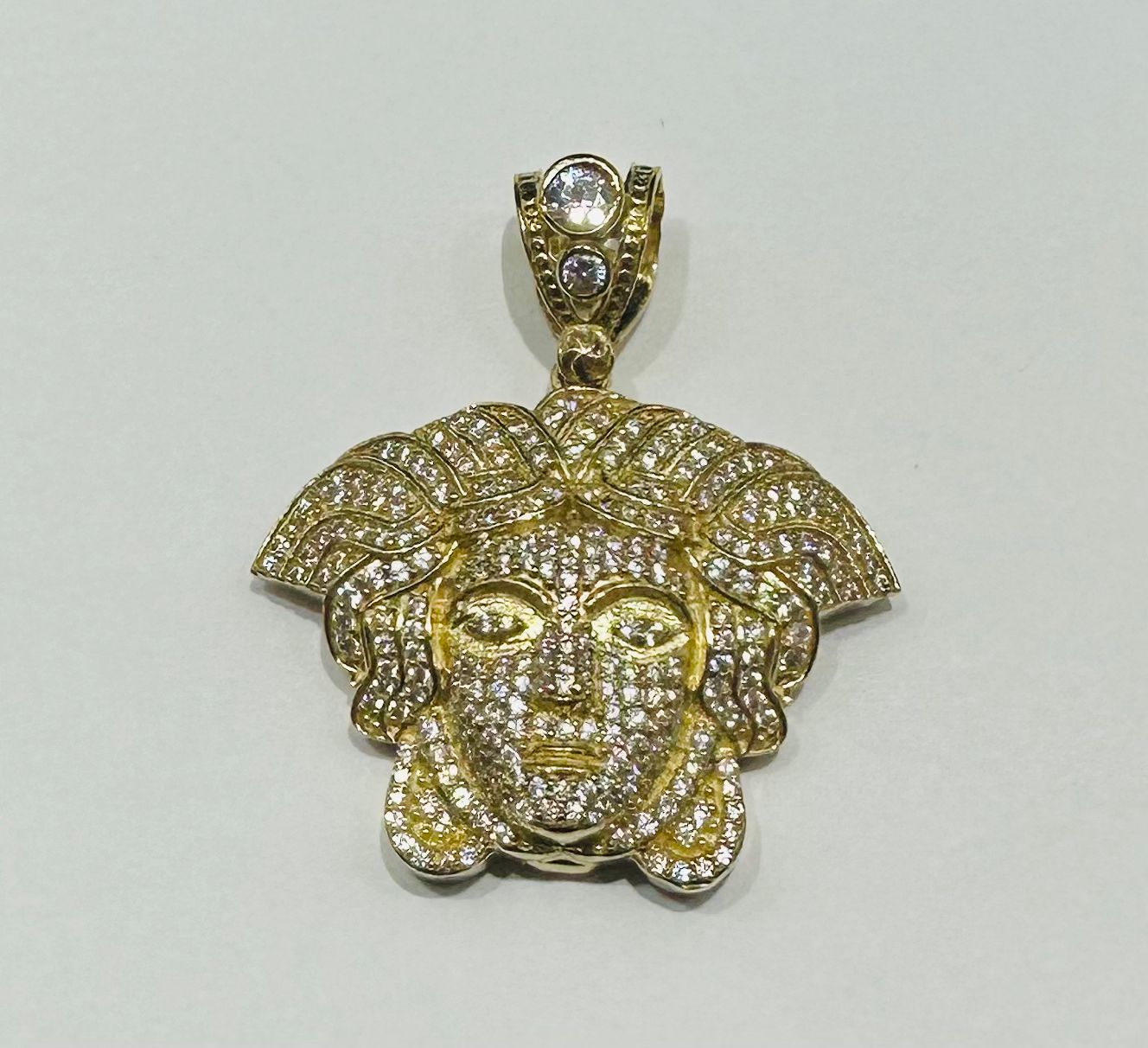 10K GOLD MEDUSA HEAD PENDANT WITH WHITE SAPPHIRE- WEIGHT: 10.6gm