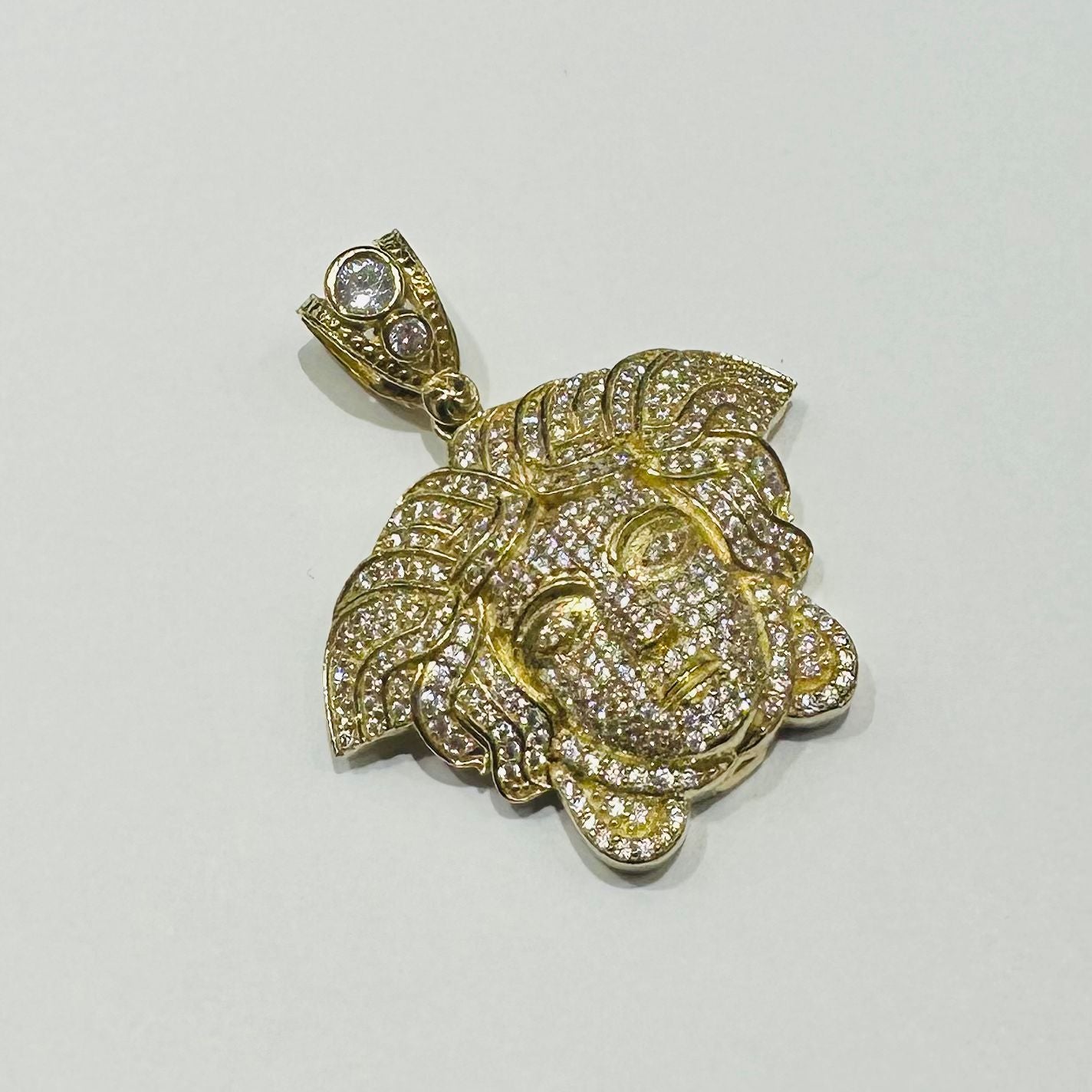 10K GOLD MEDUSA HEAD PENDANT WITH WHITE SAPPHIRE- WEIGHT: 10.6gm