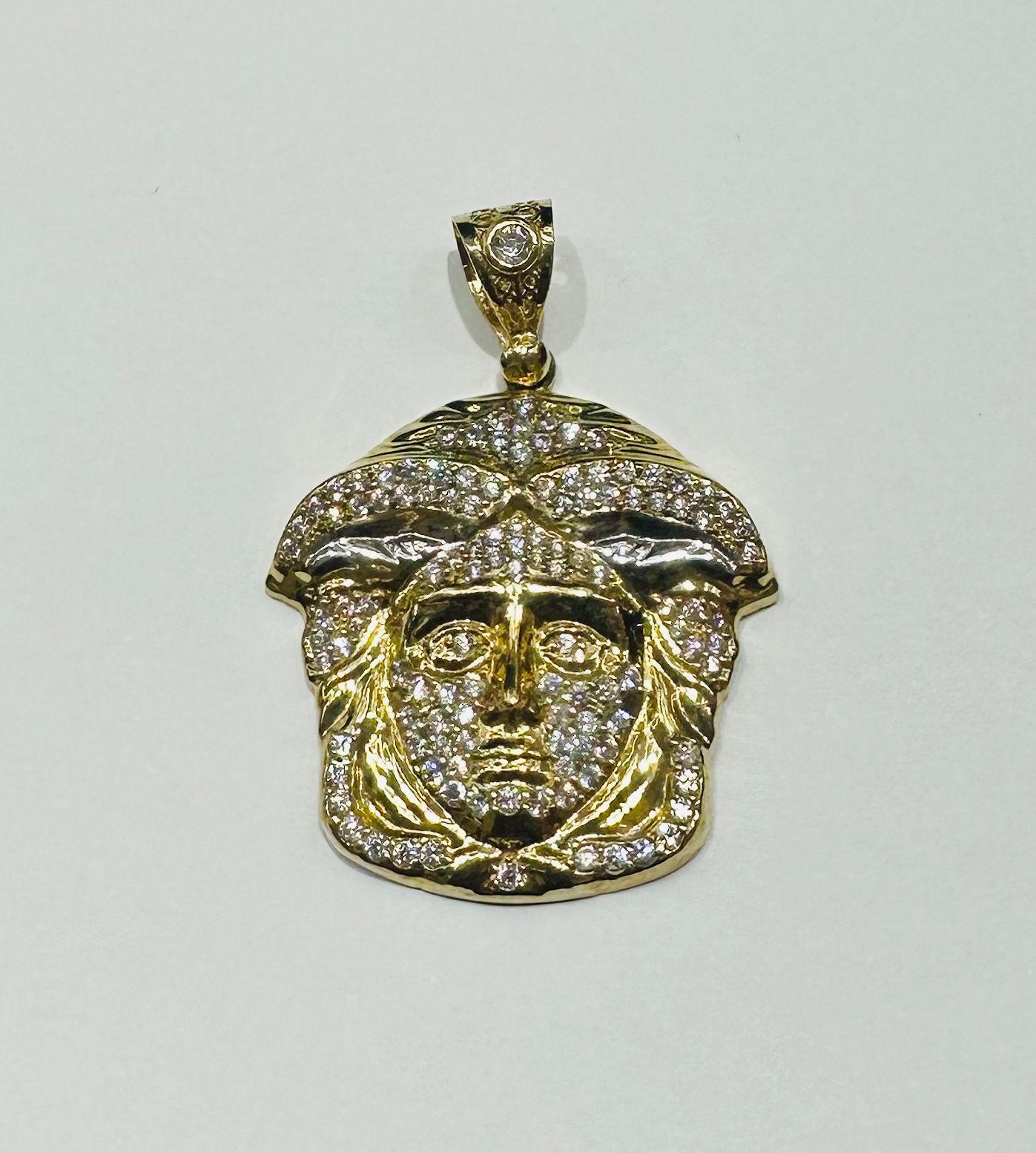 10K GOLD MEDUSA HEAD PENDANT WITH WHITE SAPPHIRE- WEIGHT: 6.2gm