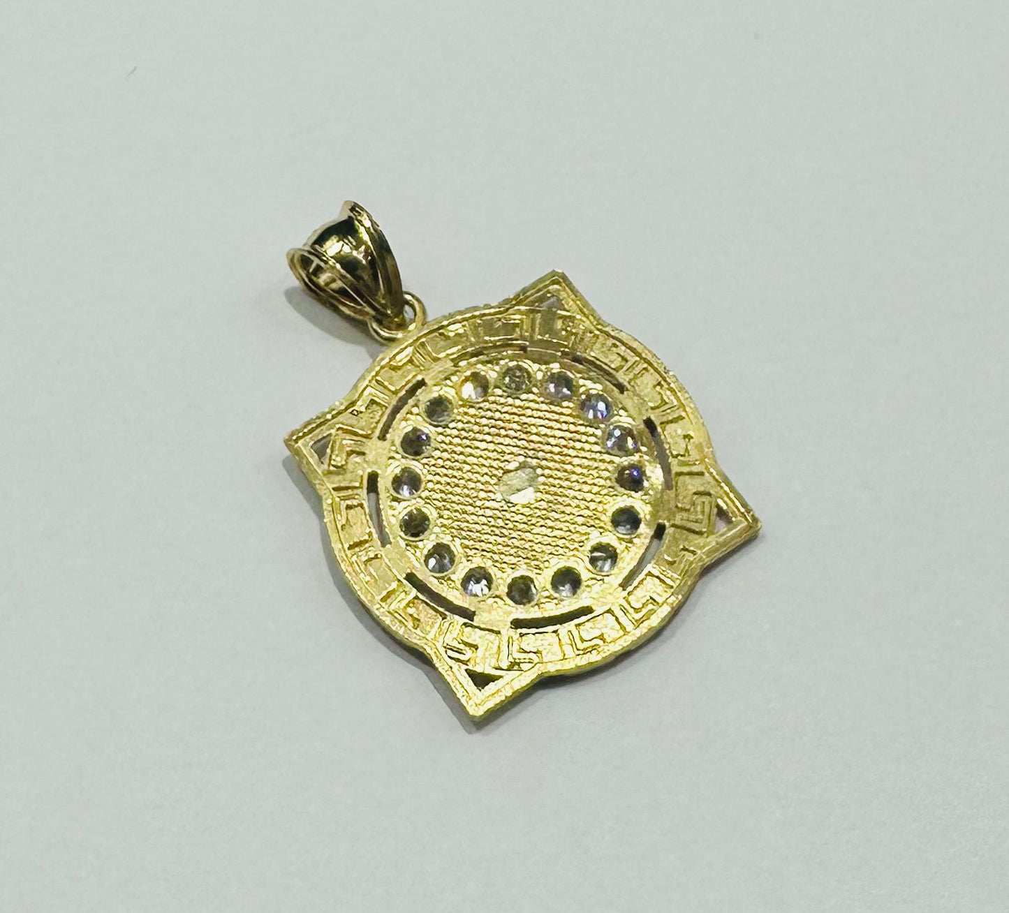 10K GOLD MEDUSA HEAD PENDANT WITH WHITE SAPPHIRE- WEIGHT: 3.9gm