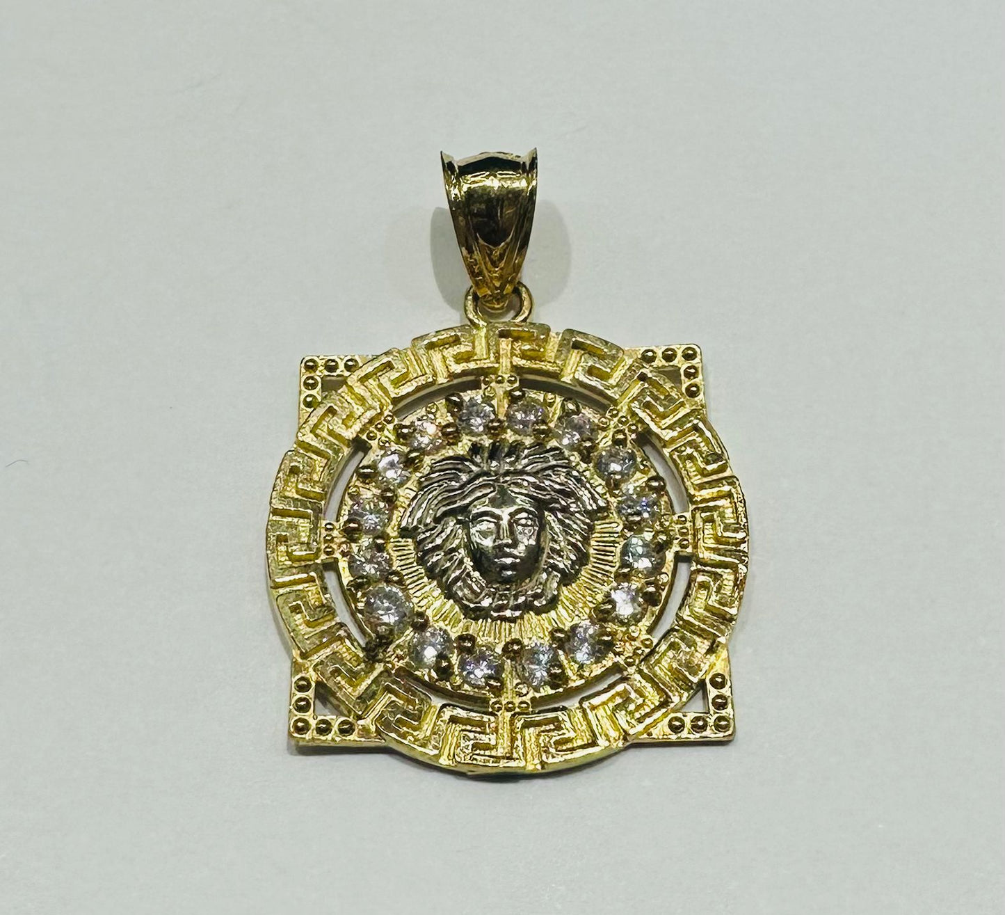 10K GOLD MEDUSA HEAD PENDANT WITH WHITE SAPPHIRE- WEIGHT: 3.9gm