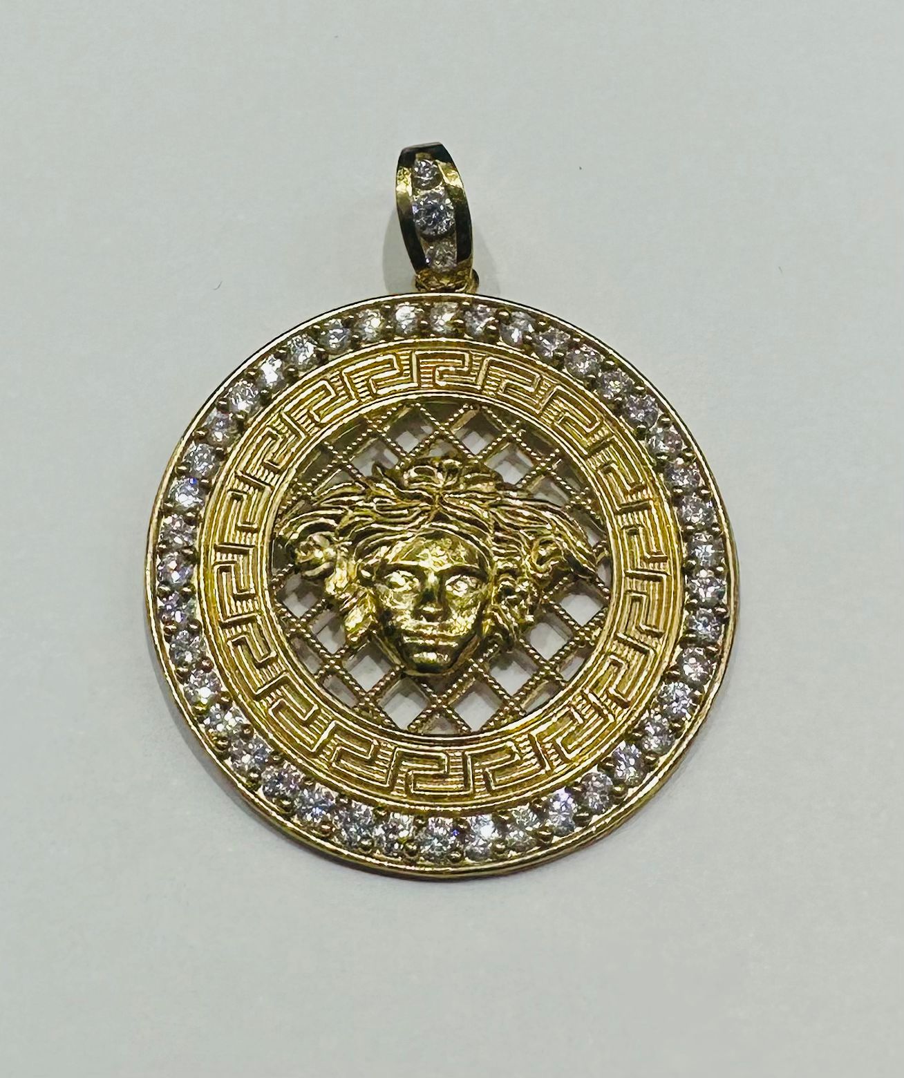 10K GOLD MEDUSA HEAD PENDANT WITH WHITE SAPPHIRE- WEIGHT: 8.5gm