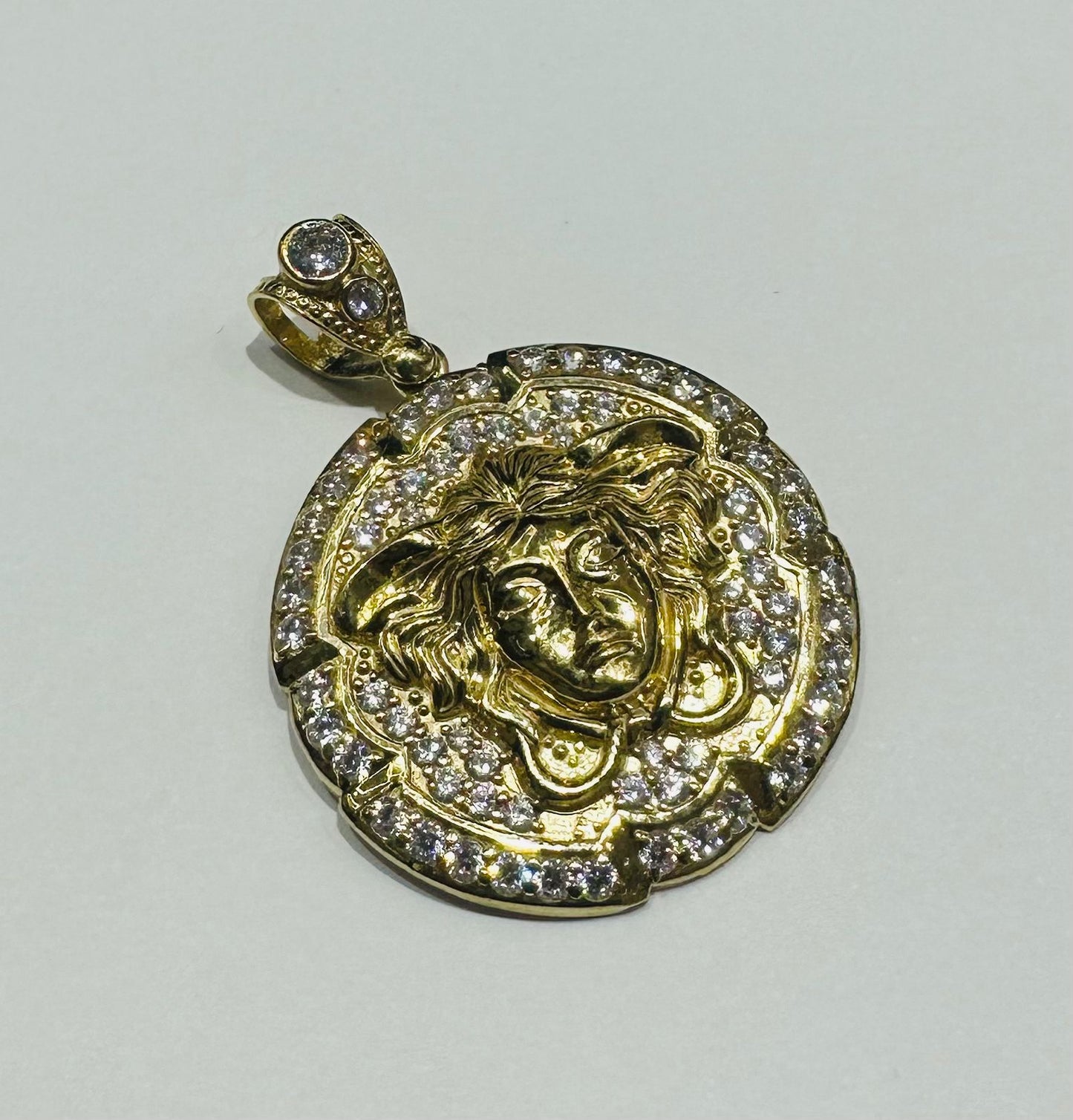 10K GOLD MEDUSA HEAD PENDANT WITH WHITE SAPPHIRE- WEIGHT: 8.1gm