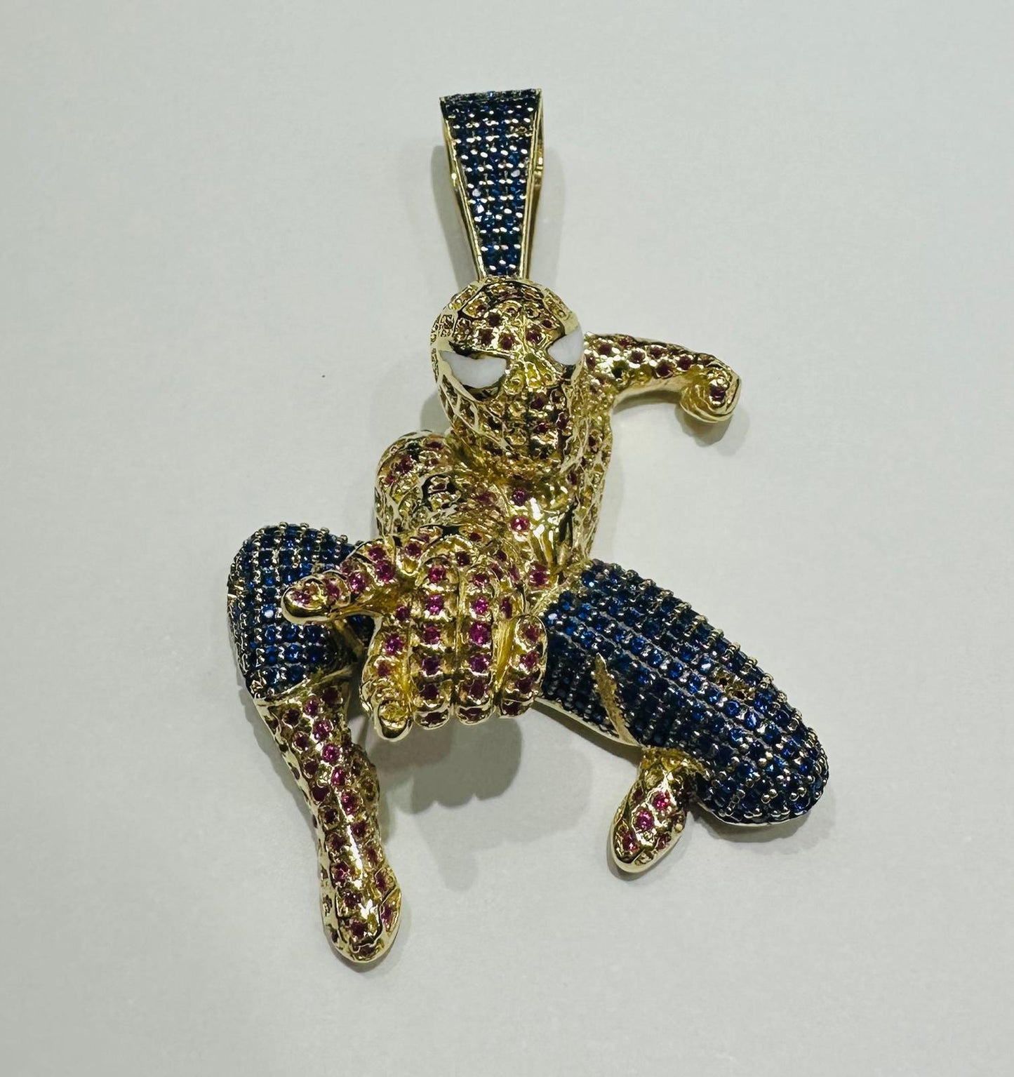 10K GOLD SPIDERMAN PENDANT WITH SAPPHIRE STONES- WEIGHT: 15.2gm
