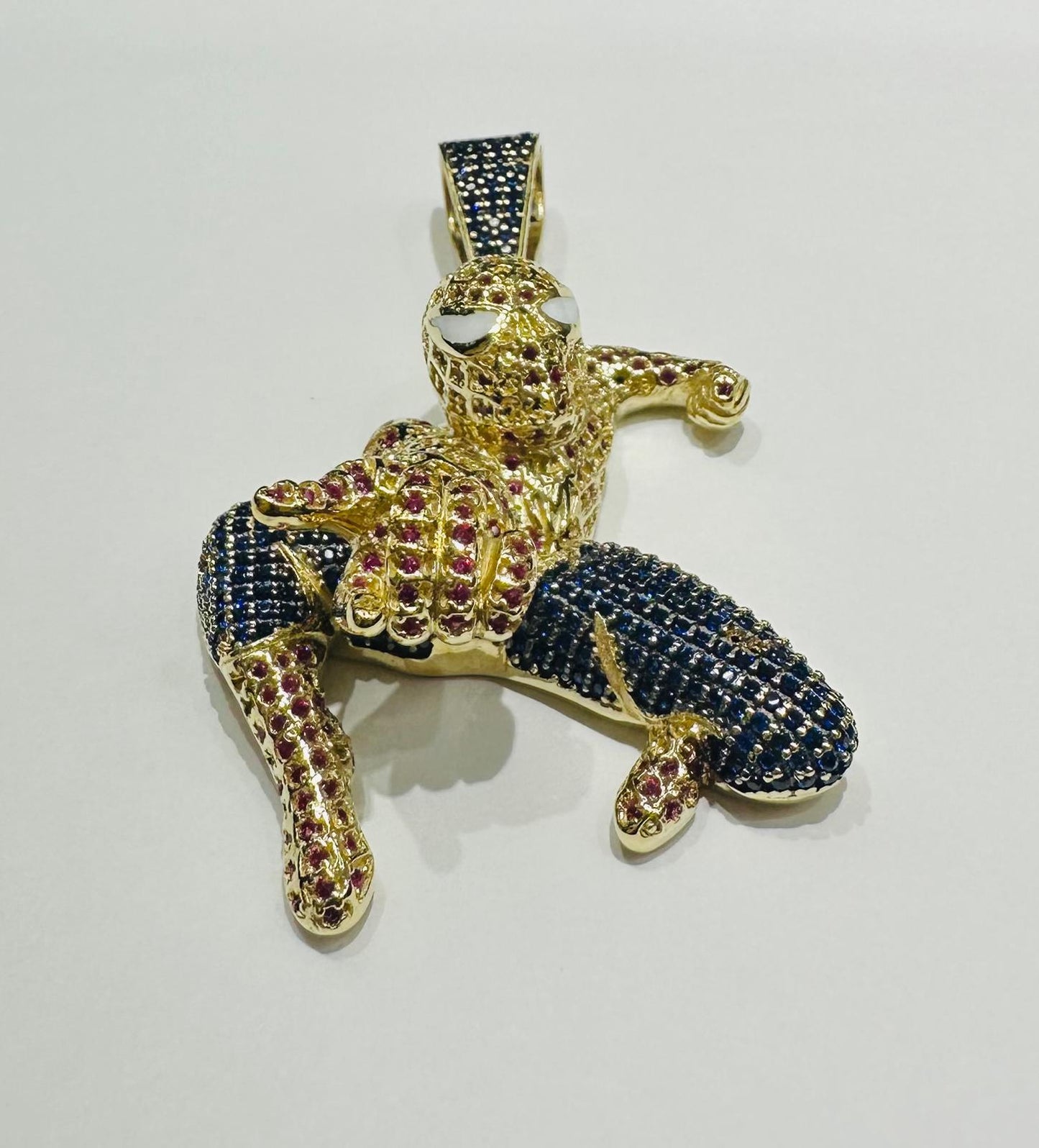 10K GOLD SPIDERMAN PENDANT WITH SAPPHIRE STONES- WEIGHT: 15.2gm