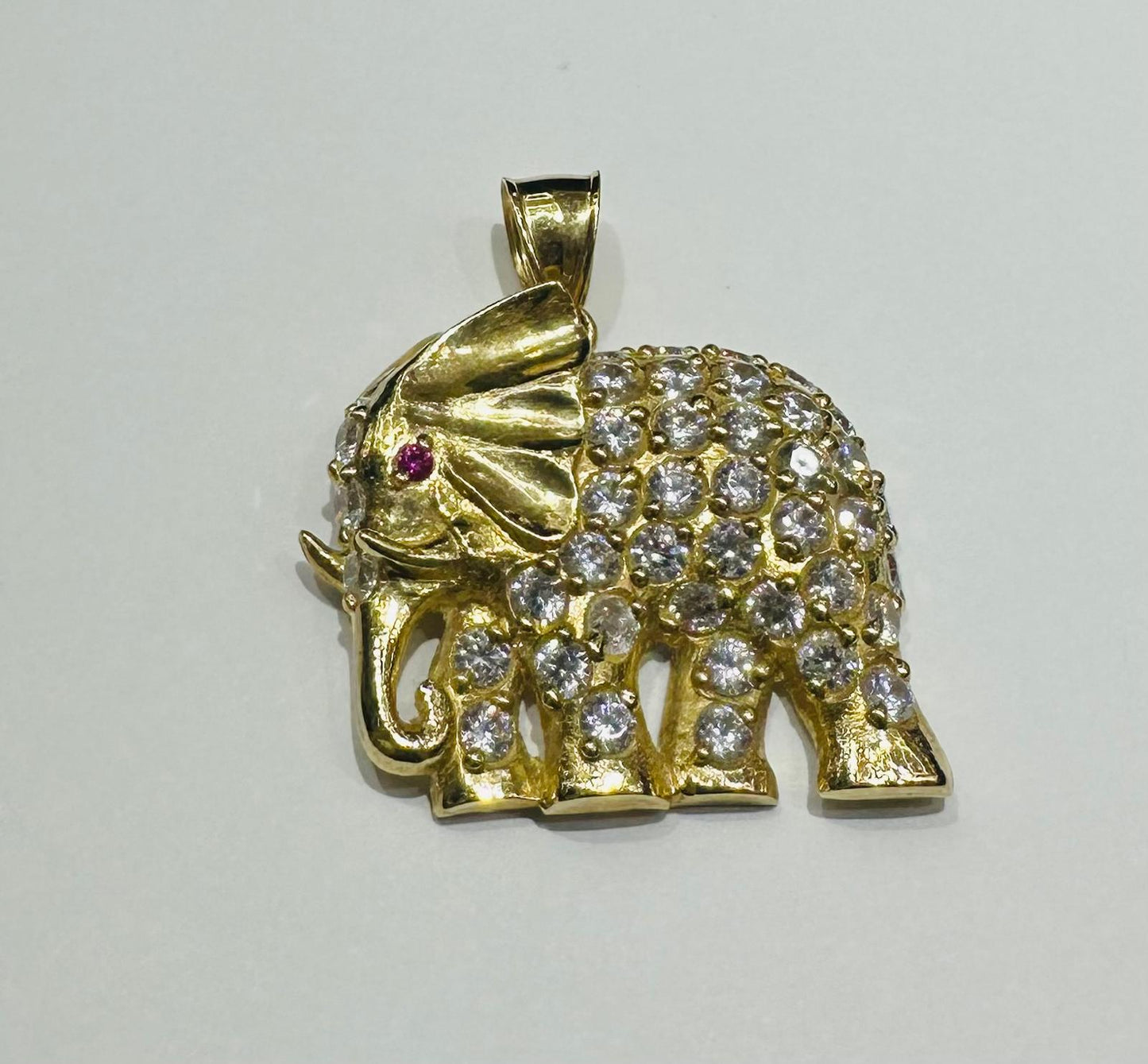 10K GOLD ELEPHANT PENDANT WITH WHITE SAPPHIRE- WEIGHT: 10.3gm