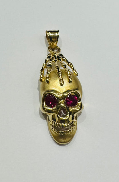 10K GOLD SKULL PENDANT WITH SAPPHIRE STONE- WEIGHT: 9.1gm