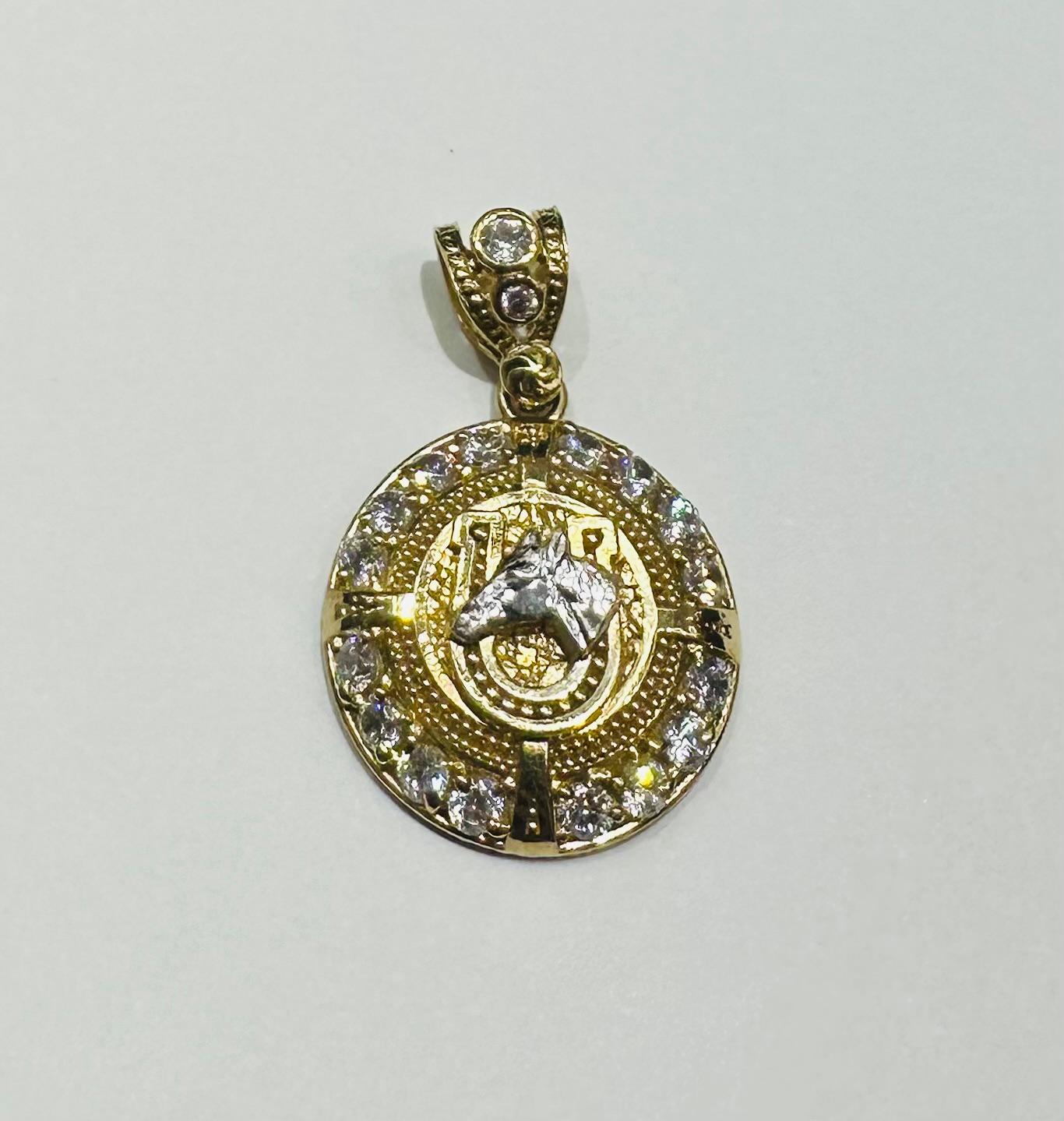 10K GOLD HORSESHOE PENDANT- WEIGHT: 4.5gm