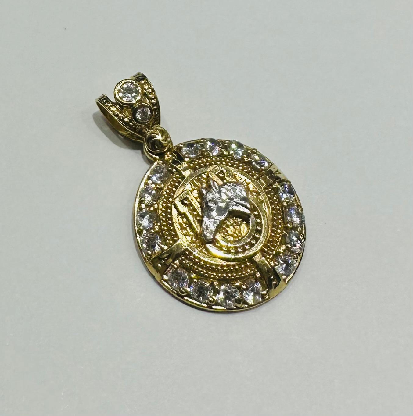 10K GOLD HORSESHOE PENDANT- WEIGHT: 4.5gm